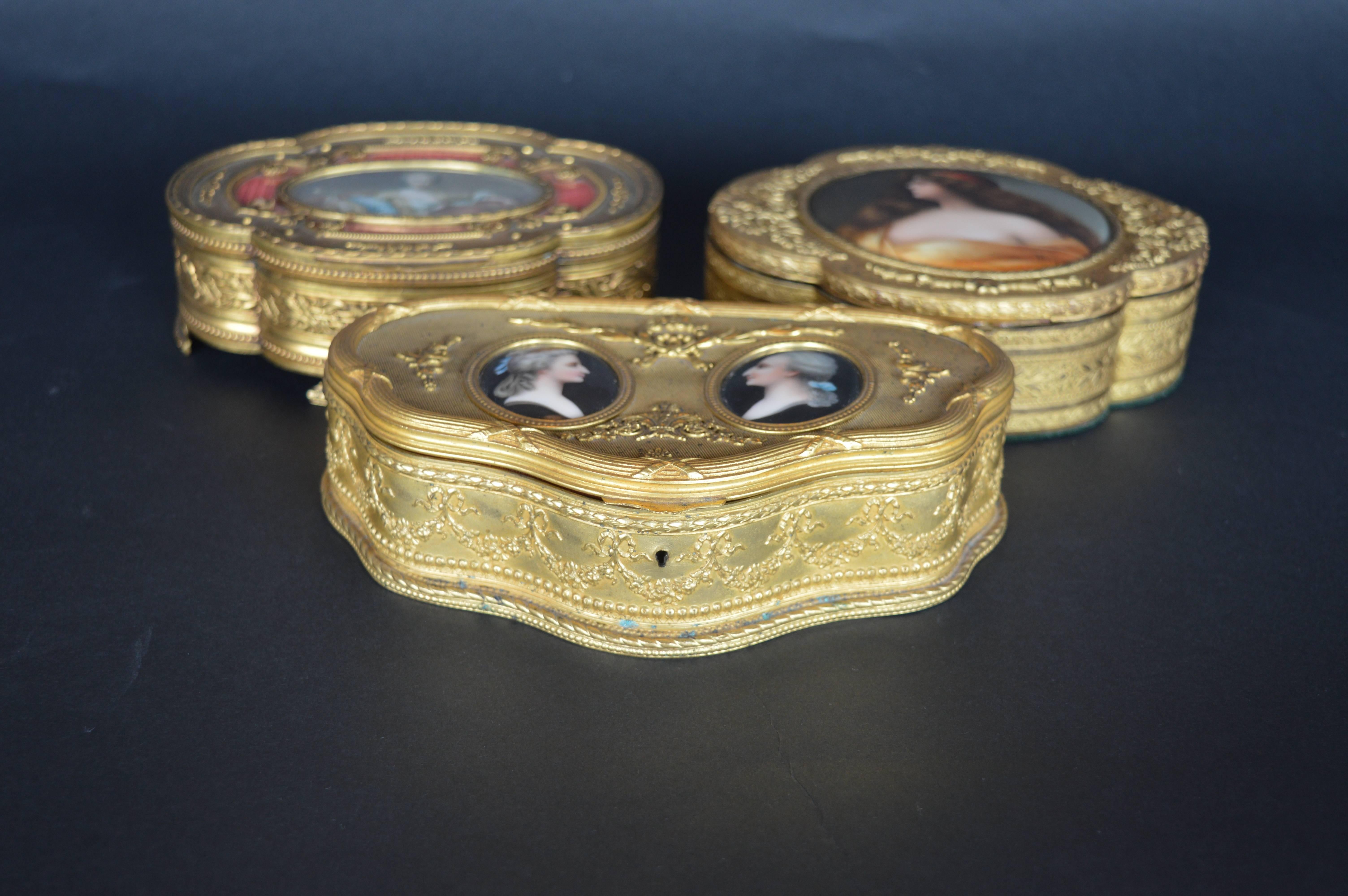 Three 19th century French porcelain plaque with enamel. One is hand-painted.
Boxes measure: 6