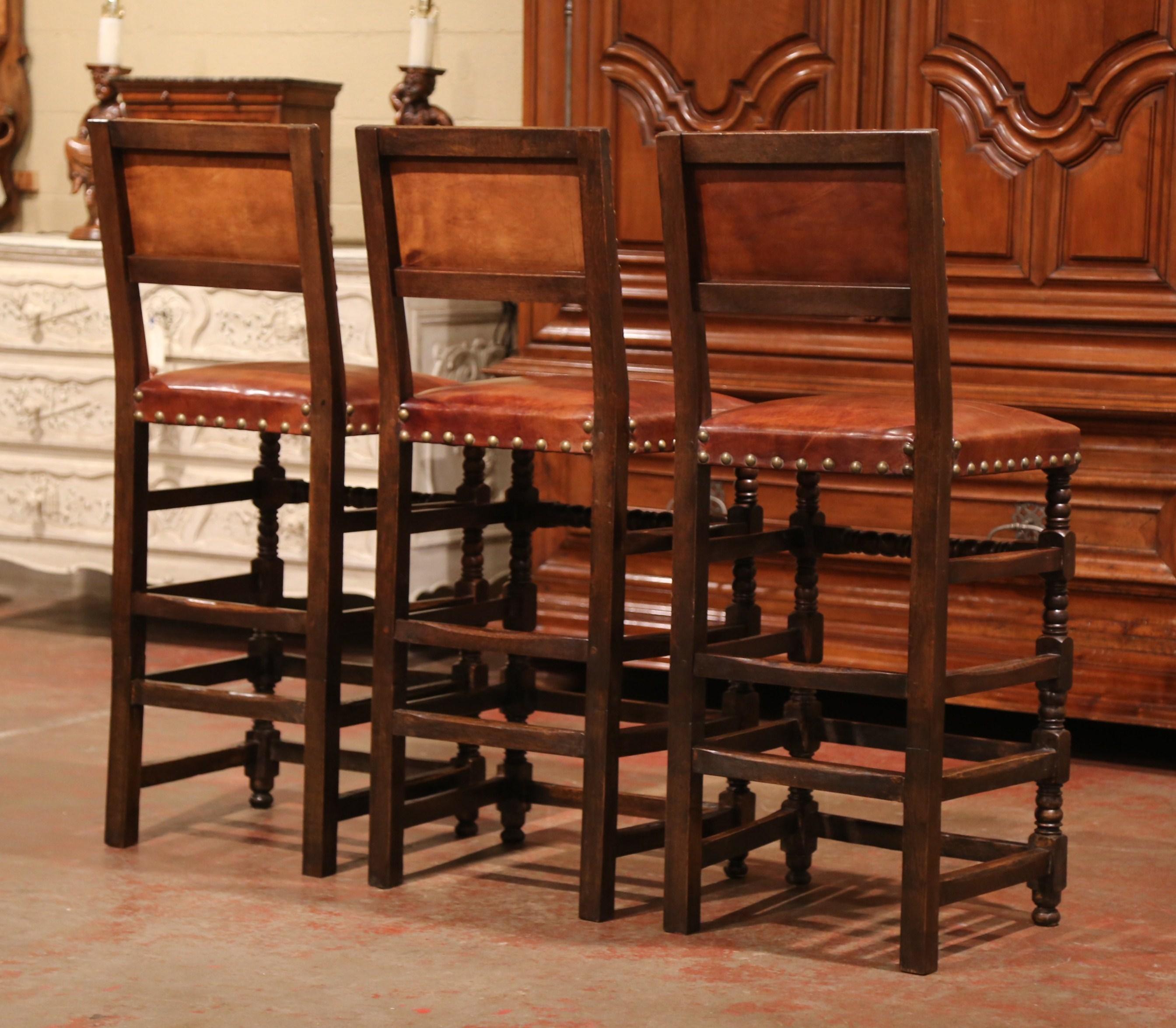 Set of Three 19th Century French Carved Oak and Brown Leather Bar Stools 5