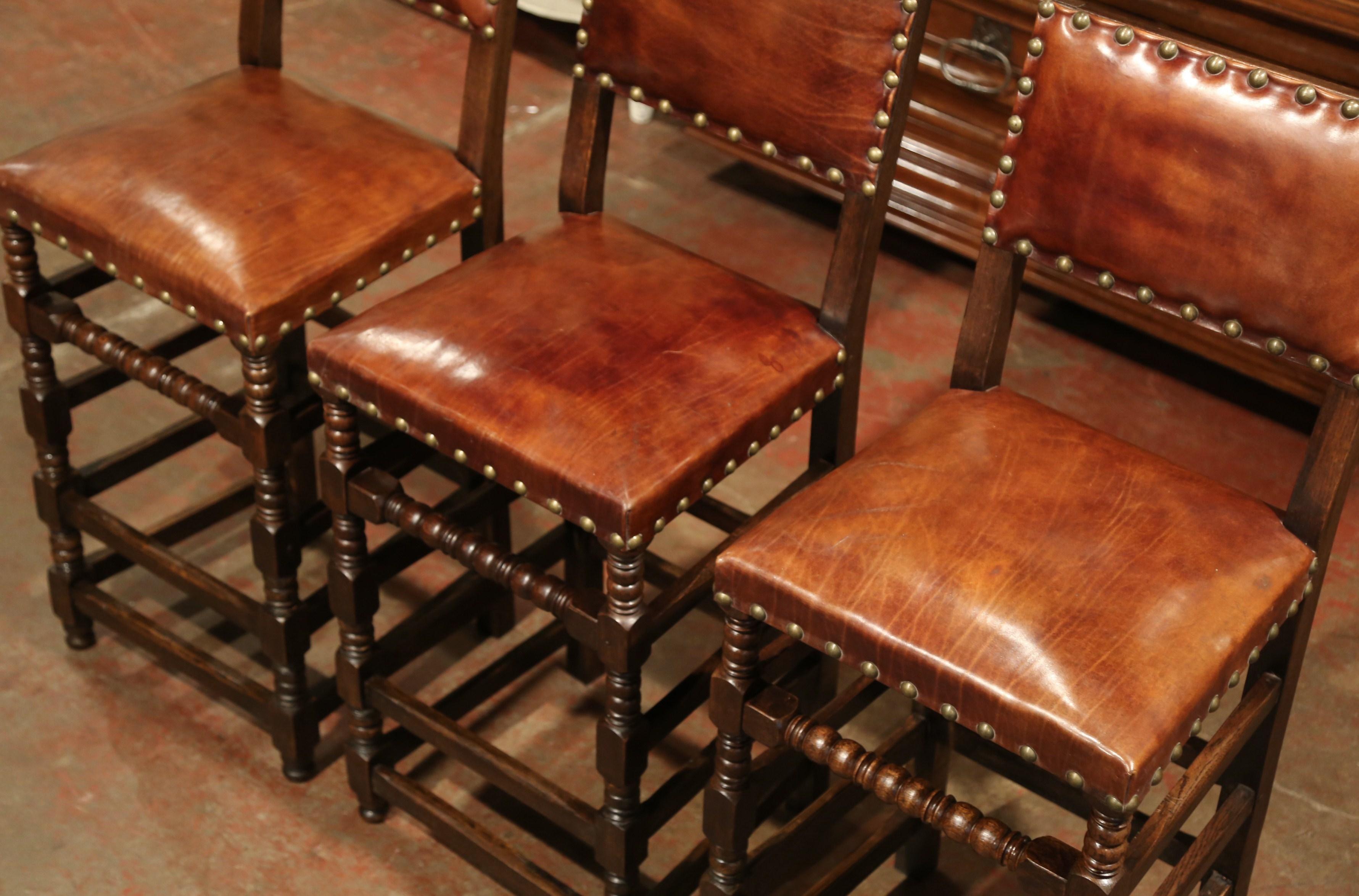 Hand-Carved Set of Three 19th Century French Carved Oak and Brown Leather Bar Stools