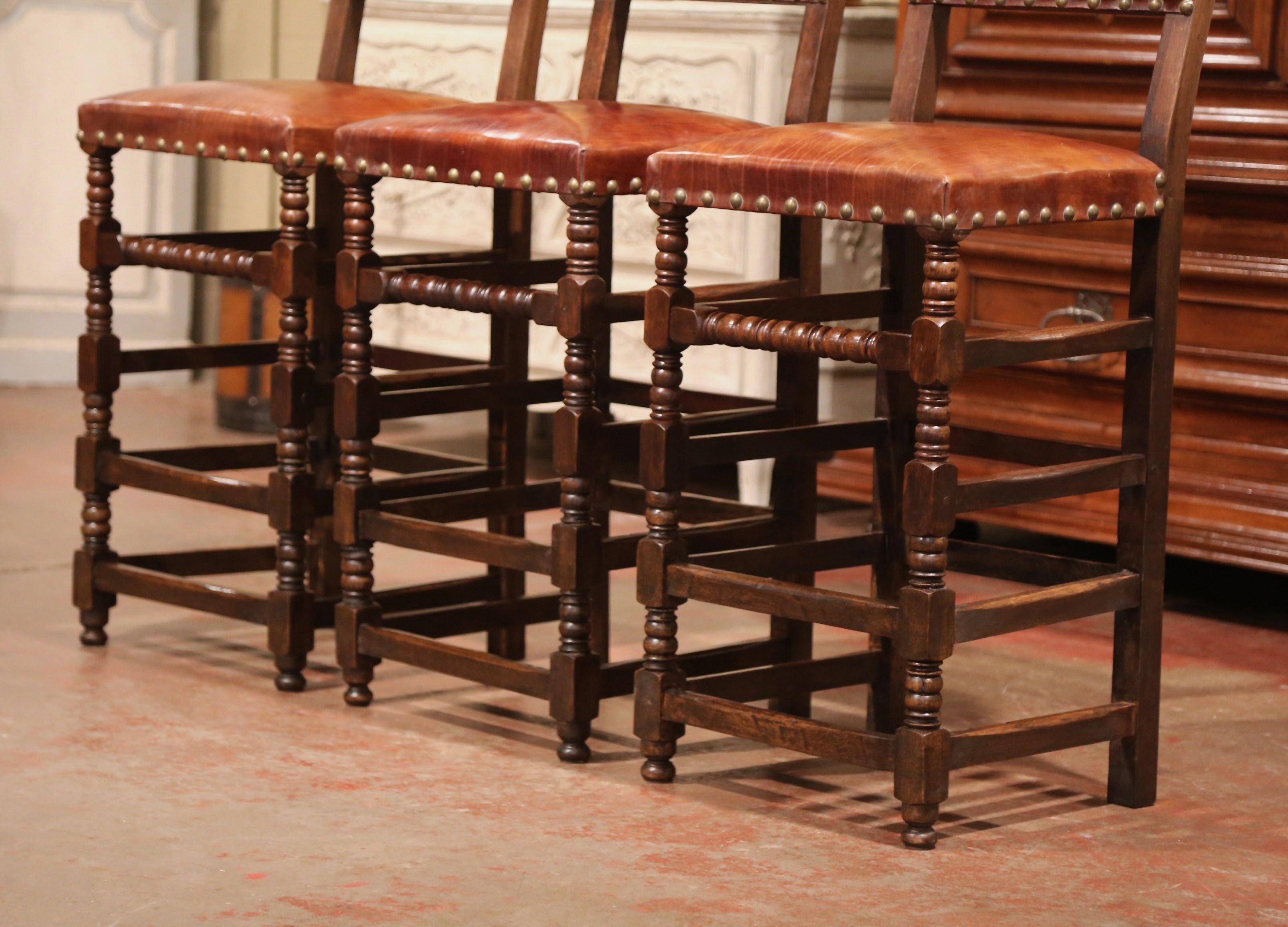 Set of Three 19th Century French Carved Oak and Brown Leather Bar Stools 2