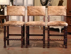 Set of Three 19th Century French Carved Oak, Leather and Cow Hide Bar Stools