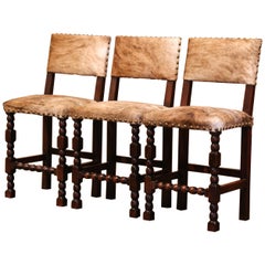 Antique Set of Three 19th Century French Carved Oak, Leather and Cow Hide Bar Stools