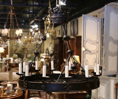 Set of Three 19th Century French Gothic Twelve-Light Forged Iron Chandeliers