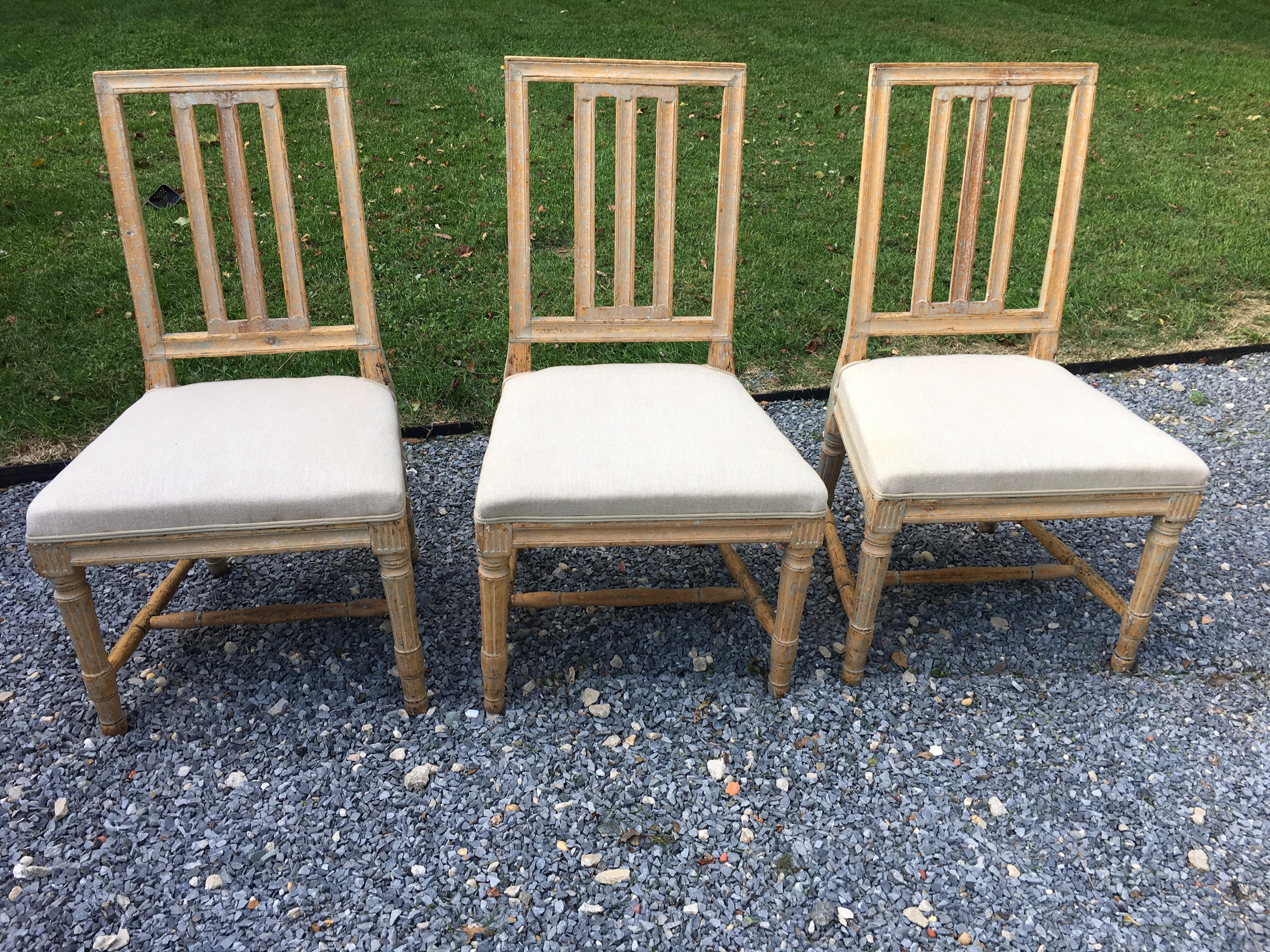Set of three 19th century Gustavian chairs in original color
Chairs have been upholstered in linen.


 