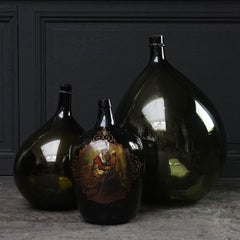 Set of Three 19th Century Italian Blown Demijohn or Damigiana Glass Bottles