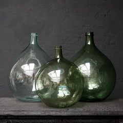Set of Three 19th Century Large Blown Dame Jeanne, Bonbonne Green Glass Bottles
