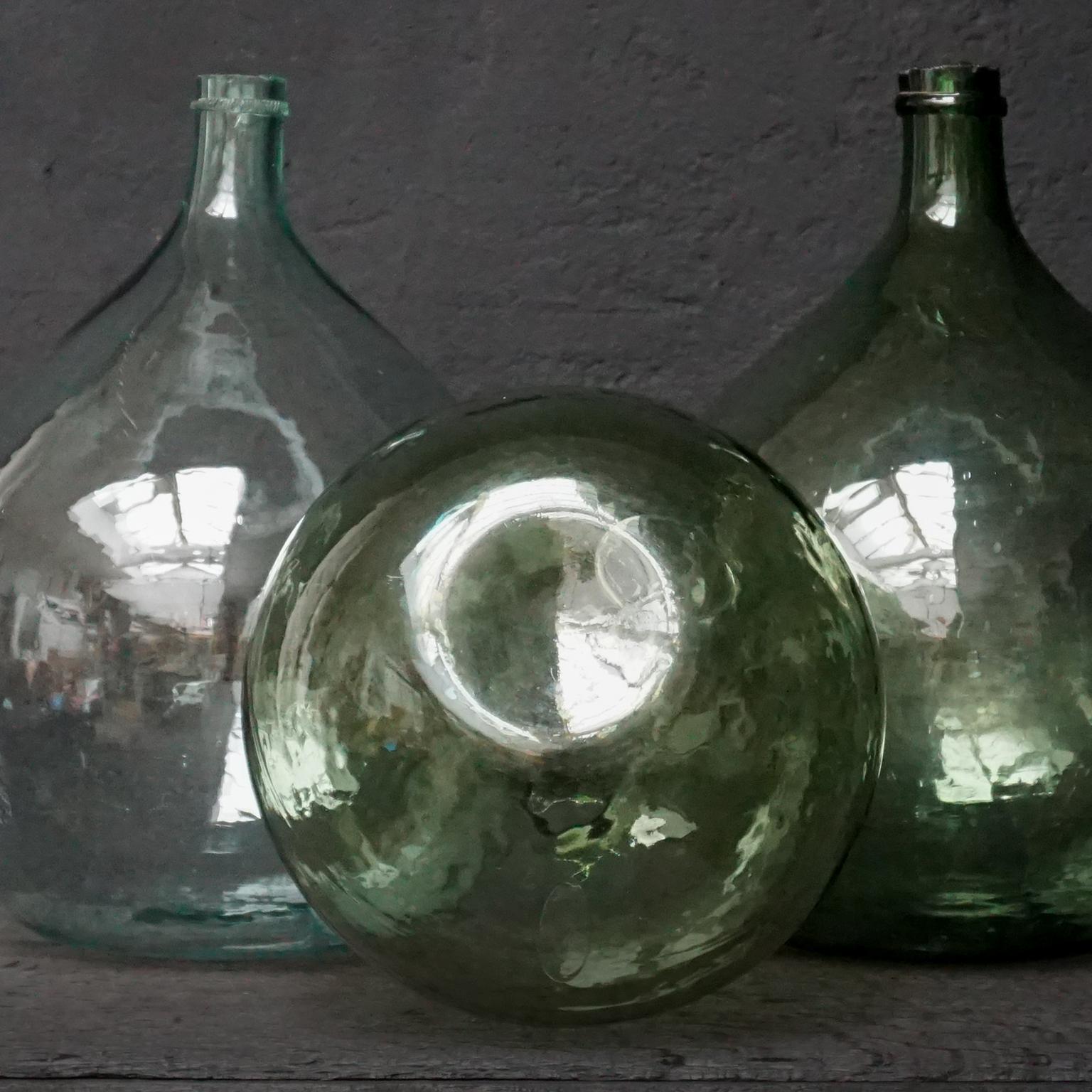 Set of Three 19th Century Large Blown Dame Jeanne, Bonbonne Green Glass Bottles In Good Condition In Haarlem, NL
