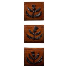 Set of Three 19th Century Satin Wood Thistle Plaques