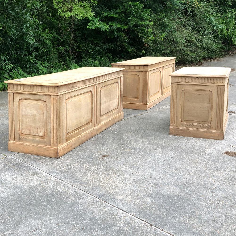 Set of three 19th century stripped oak store counters is a perfect choice for the office or as a kitchen island grouping, or even counters in the study! Another use would be to put each in adjacent rooms for continuity throughout the interior.