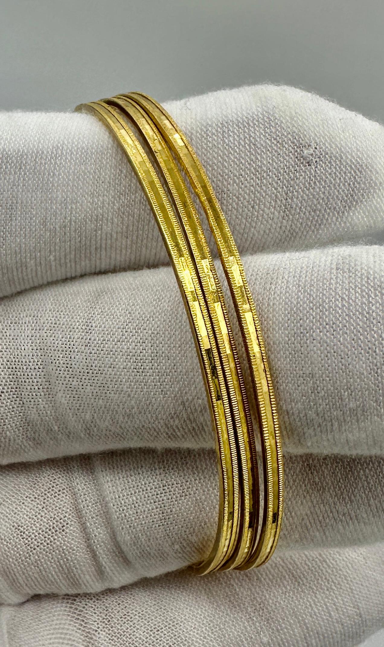 Contemporary Set Of Three 22 Karat Gold Bangle Stacking Bracelets 26.6 Grams Yellow Gold For Sale