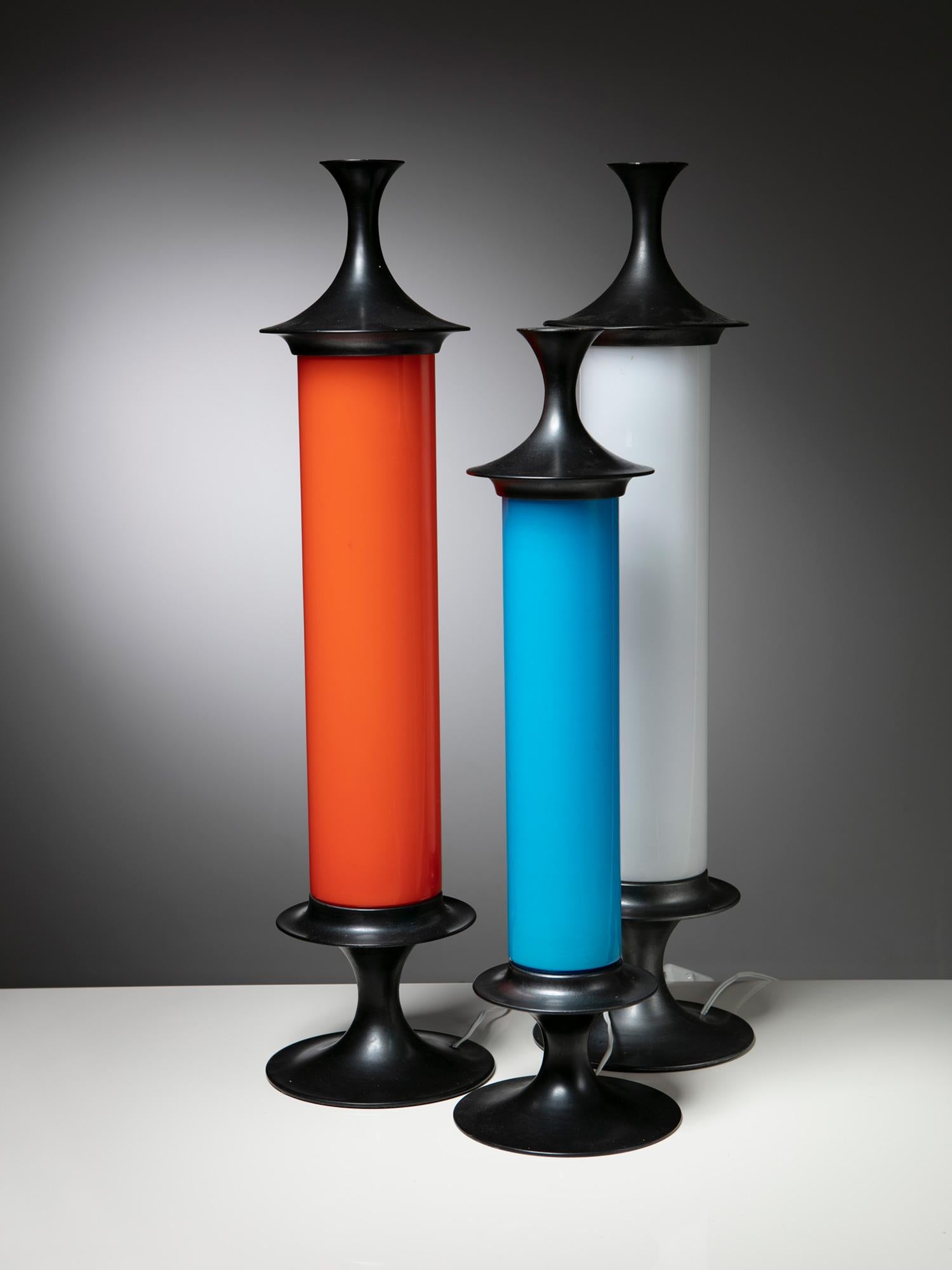Rare set of three table lamps with colored glass and metal frame.
Slim shaped, work well together and alone as well.
Size refers to the tallest model.