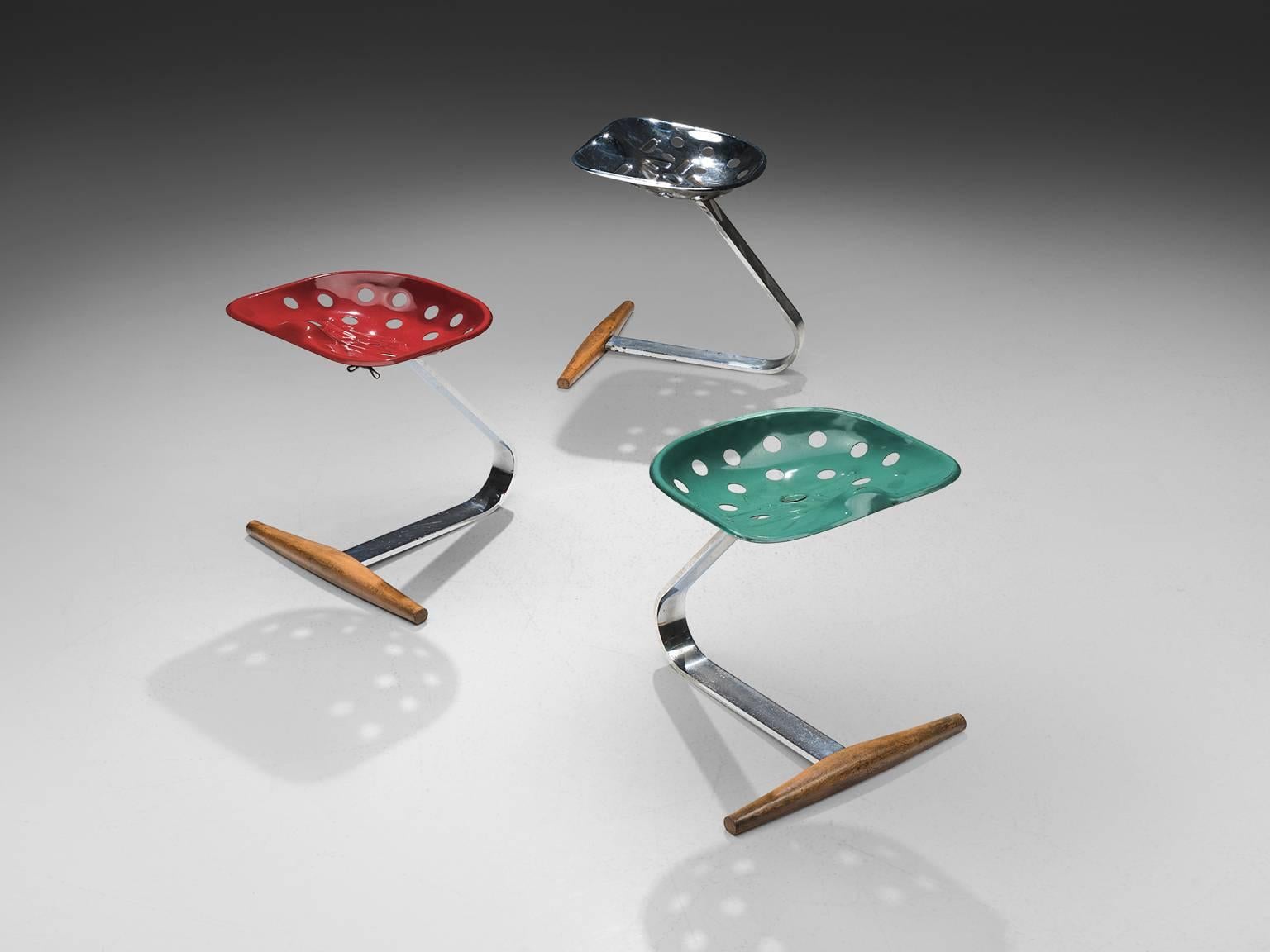 Achille & Pier Giacomo Castiglioni for Zanotta, 'Mezzadro' or 'Tractor' stools, metal, painted red, turquoise and silver metal and wood, Italy, 1957.

These three Mezzadro stools are executed in a in light blue-green, silver and red. The bent