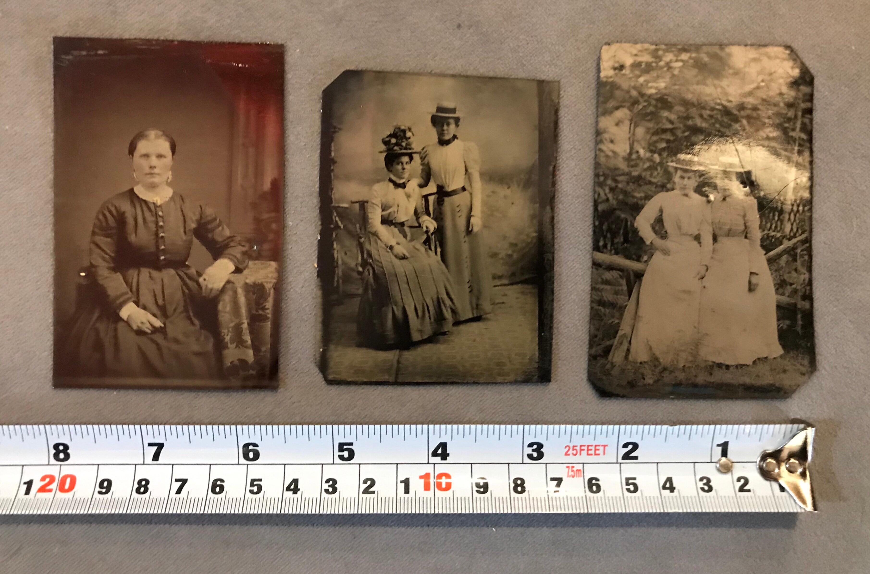 Set of three antique tintypes of women. Price is for all 3 as a set. 
A tintype is a photograph made by creating a direct positive on a thin sheet of metal coated with a dark lacquer or enamel and used as the support for the photographic emulsion.