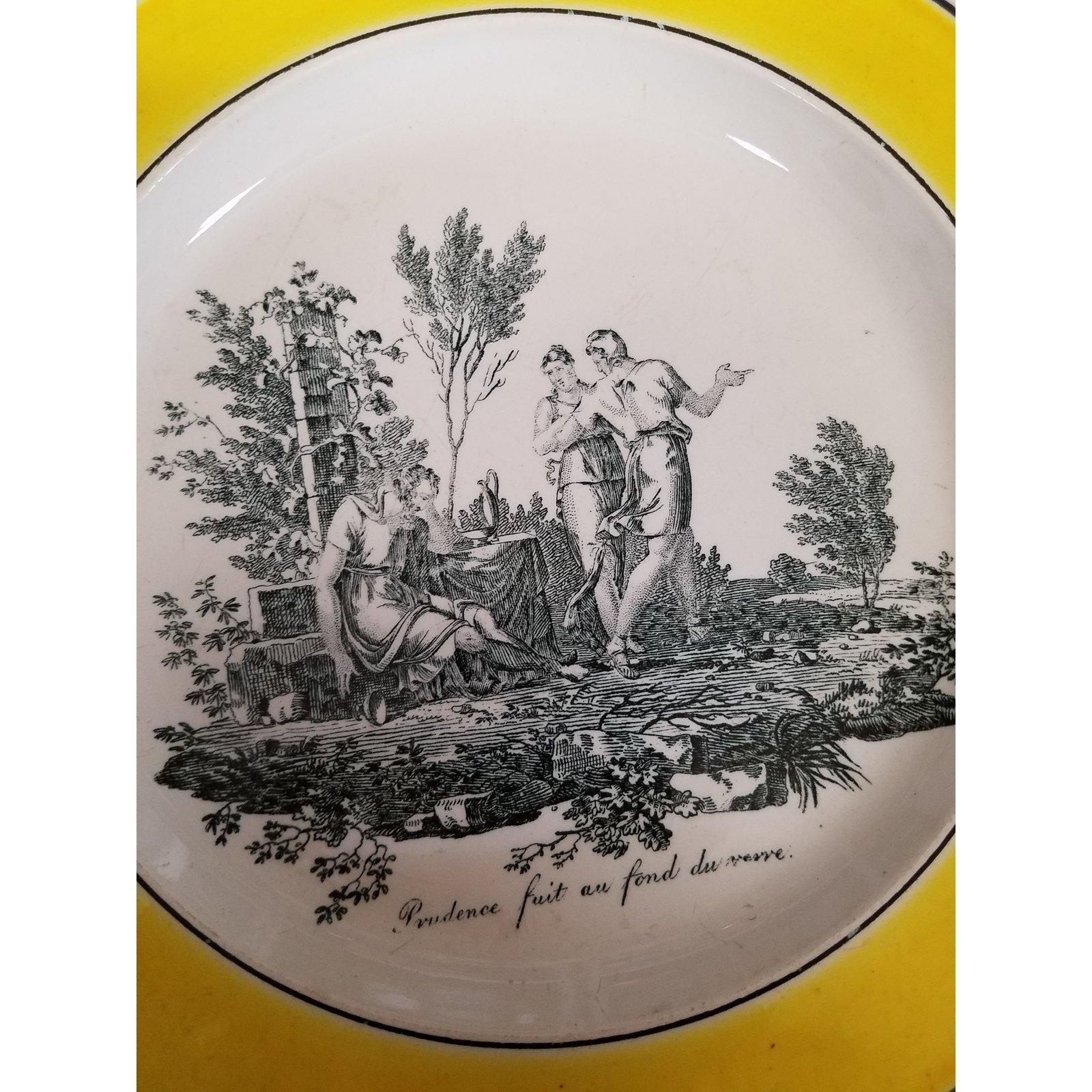 A set of three very early 19th century French classical scene plates in a black transfer toile transfer pattern with vibrant canary yellow borders. Each signed Creil in very good condition with minor age related wear. Measures: 7.5 inches in