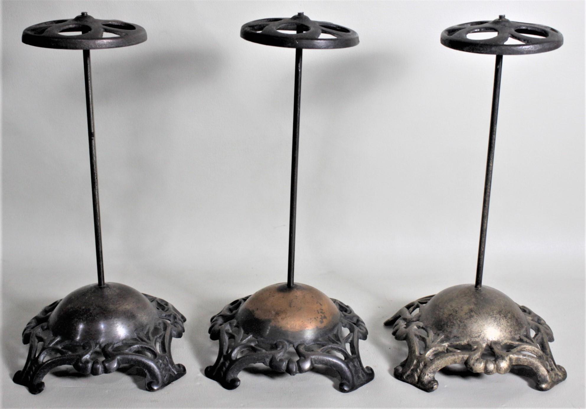 American Set of Three Antique Victorian Cast Metal Commercial Hat Stands