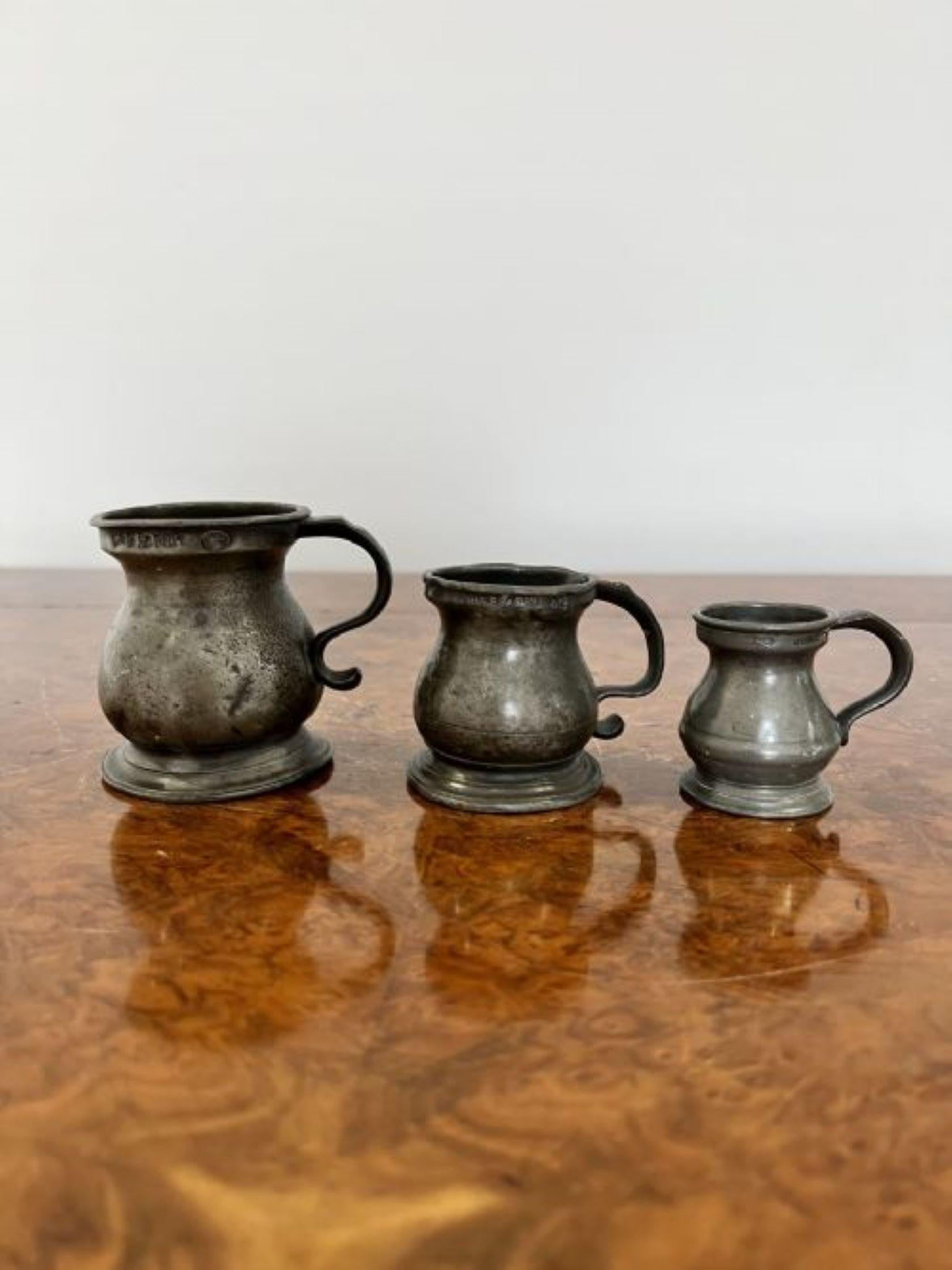 Pewter Set of three antique Victorian pewter measures marked VR For Sale