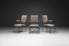 Lot de trois fauteuils à structure métallique, attribués à René Prou, France, vers les années 1940