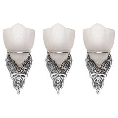 Set of Three Art Deco Frosted Relief Glass Sconces with Silvered Fittings