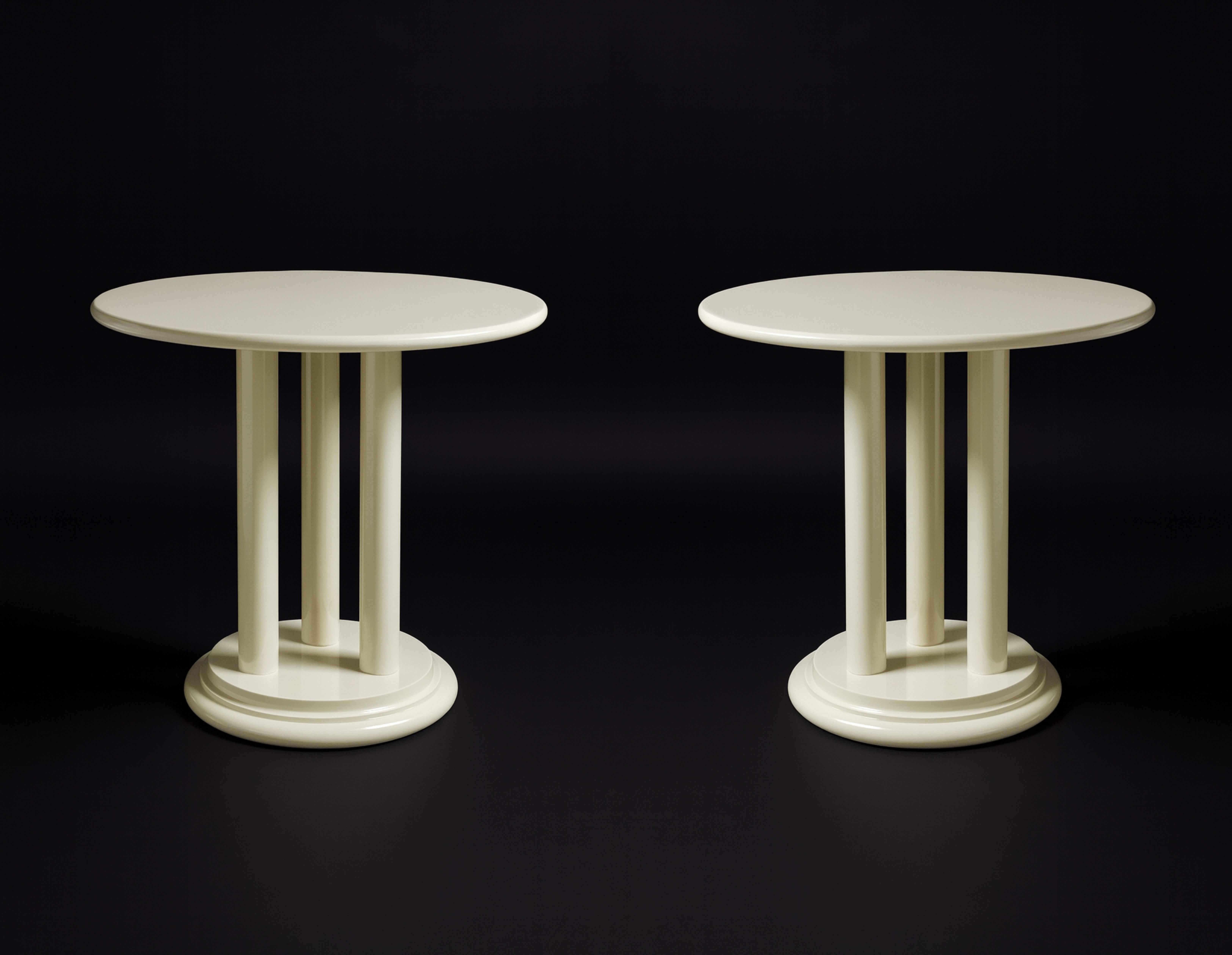 Add a versatile set of three tables that features an off-white finish (color reference: #F2F0EF), ideal for multiple uses and space design solutions. Featuring three rounded wooden legs and a circular base, this piece combines functionality with a