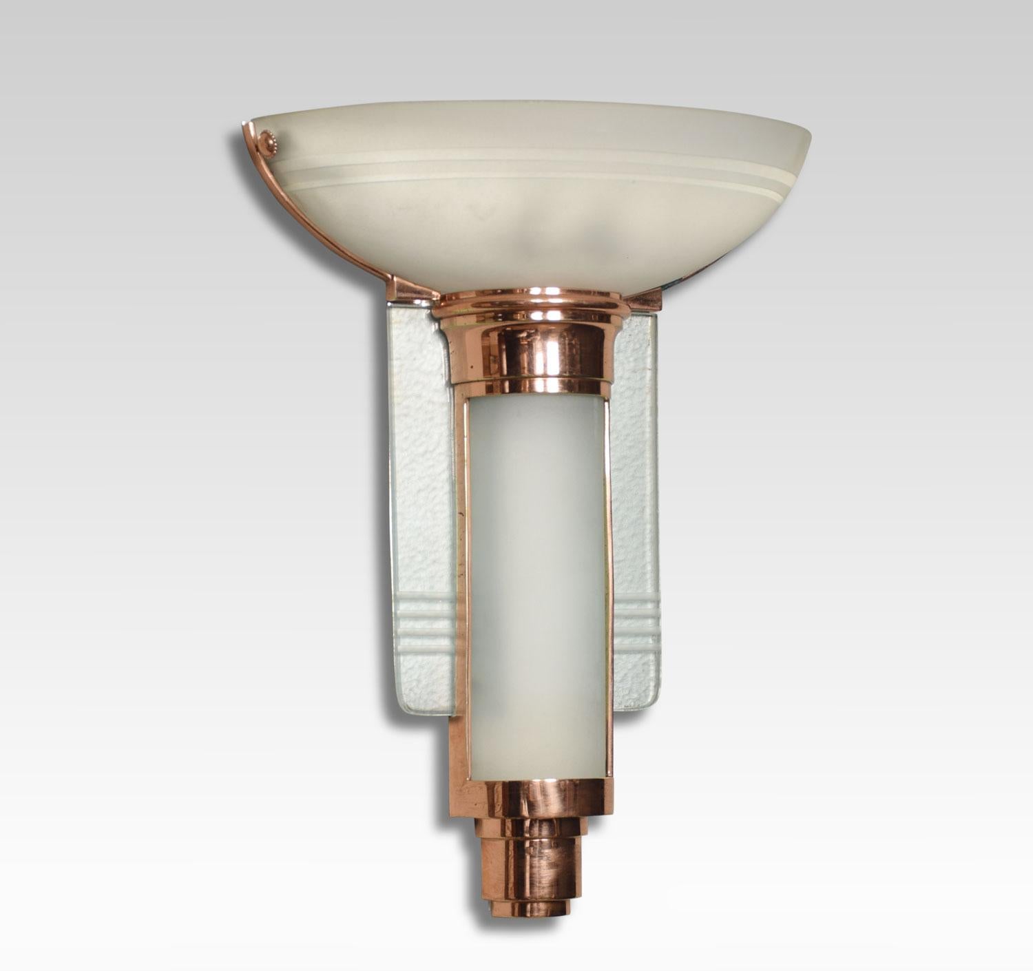 Set of three Art Deco wall lights with copper frames having inset curved and cut-glass.
Dimensions:
Height 15.5 inches
Width 11.5 inches
Depth 6.5 inches.