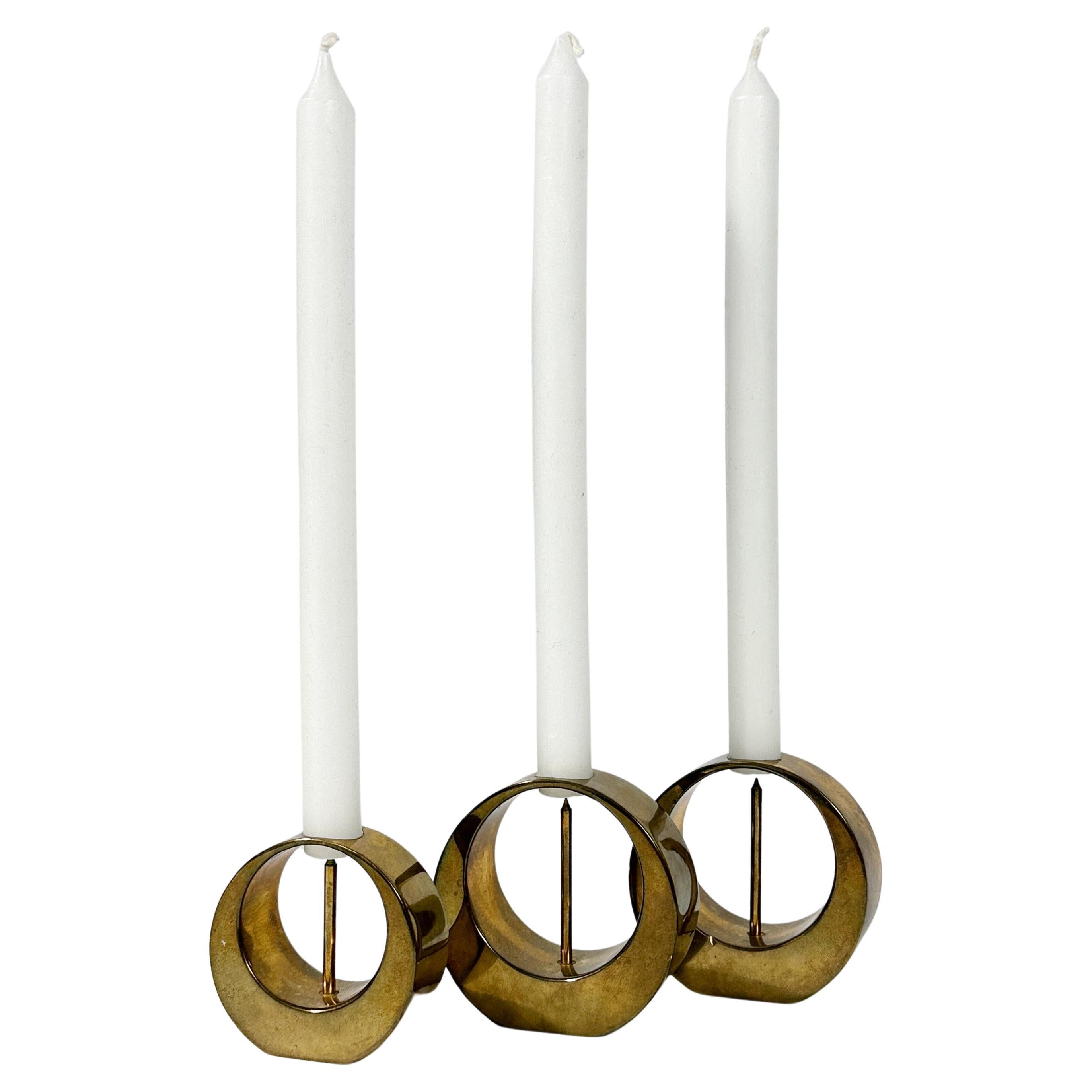 Set of three Arthur Pettersson candle holders in solid brass, hand-crafted in Kolbäck, Sweden in the 1960s.

Brass nicely aged, all marked underneath.

Height: 5 cm & 6 cm
For thin Danish candles with a Ø 12 mm


- About Arthur Pettersson, 1919 –
