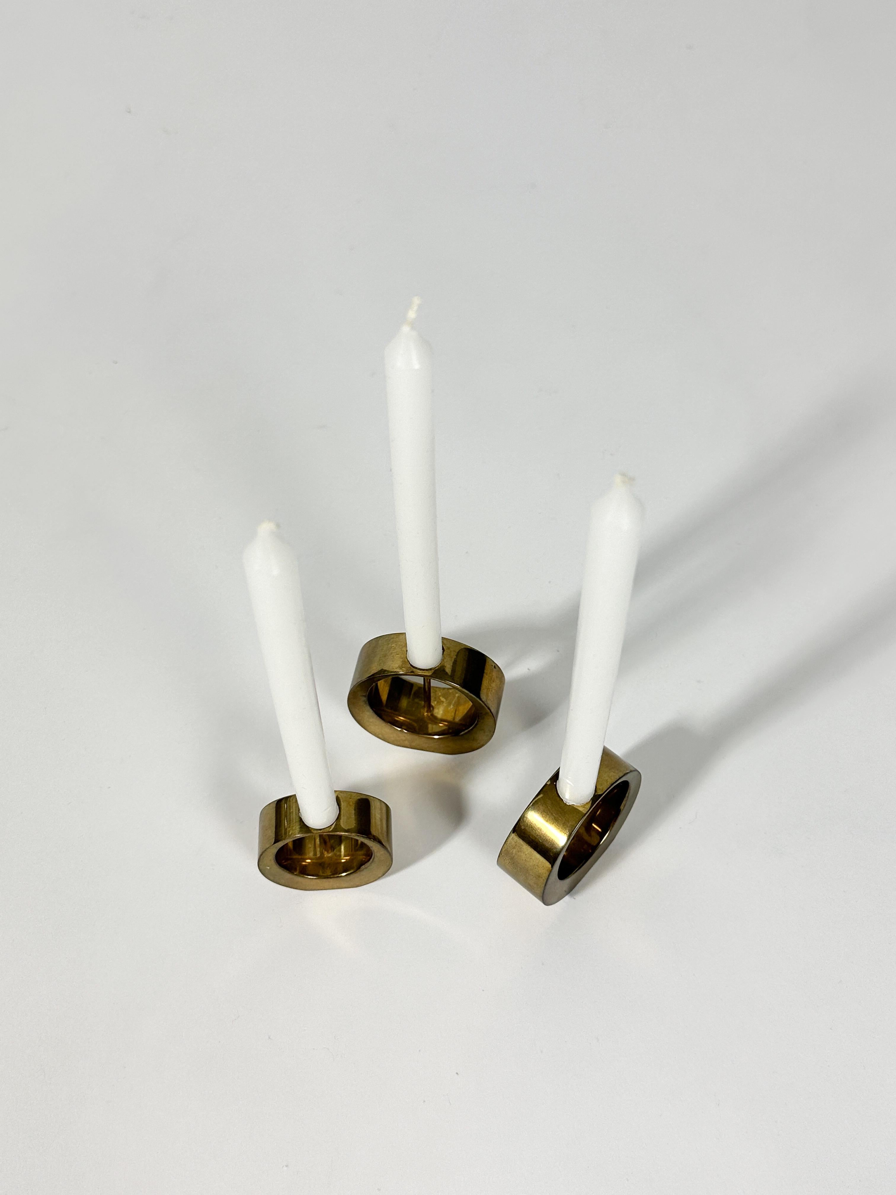 Mid-20th Century Set of Three Arthur Pettersson Candle Sticks Brass, Sweden, 1960s For Sale