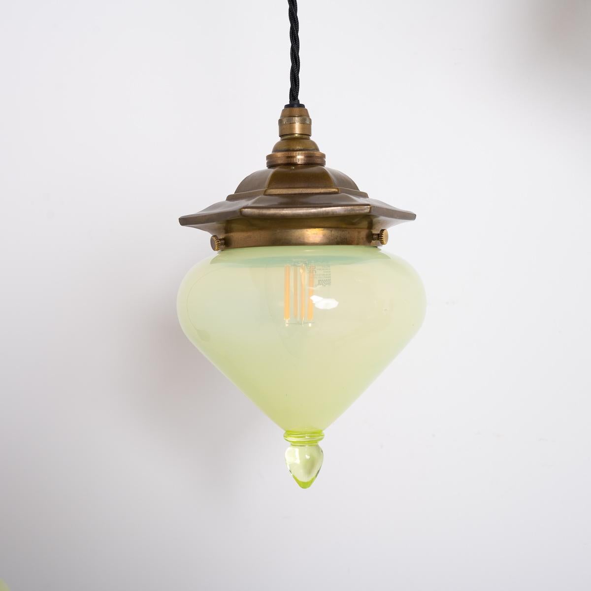 Early 20th Century Set of Three Arts & Crafts Vaseline Glass Teardrop Shades with Aged Brass Galler