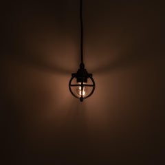 Set of Three Atlas Cast Iron Globe Cage Pendants — Industrial Bulb Guards