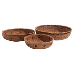 Set of three Balinese woven nesting baskets
