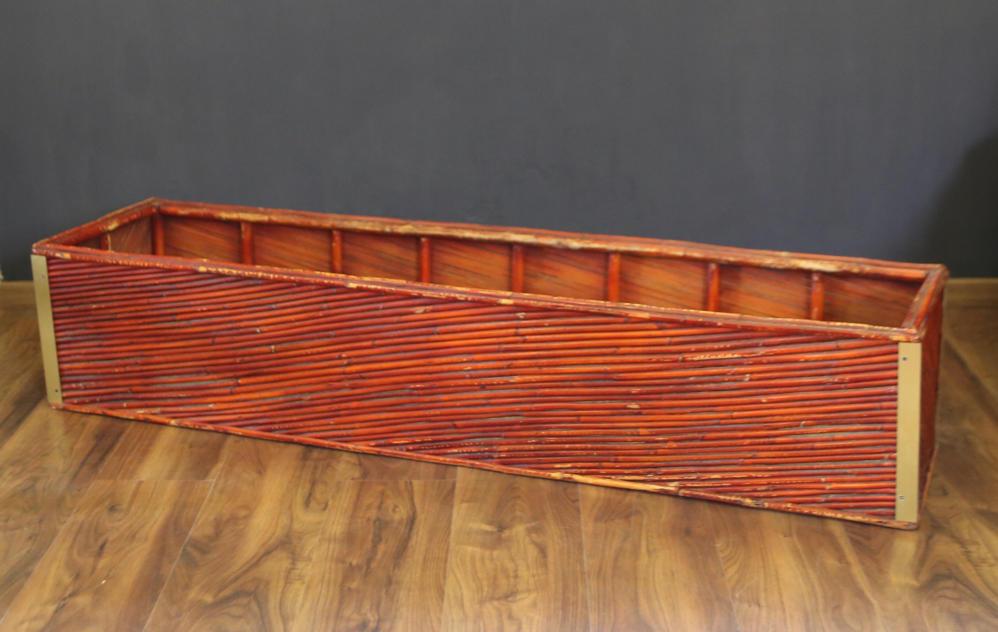 Set of three bamboo and brass plant holders from the 1970s
The first and largest of the plant holders has the following dimensions  37cm x 143cm x 31cm
the second of the plant holders has the following dimensions 48cm x 44cm x 31cm
Plant holder