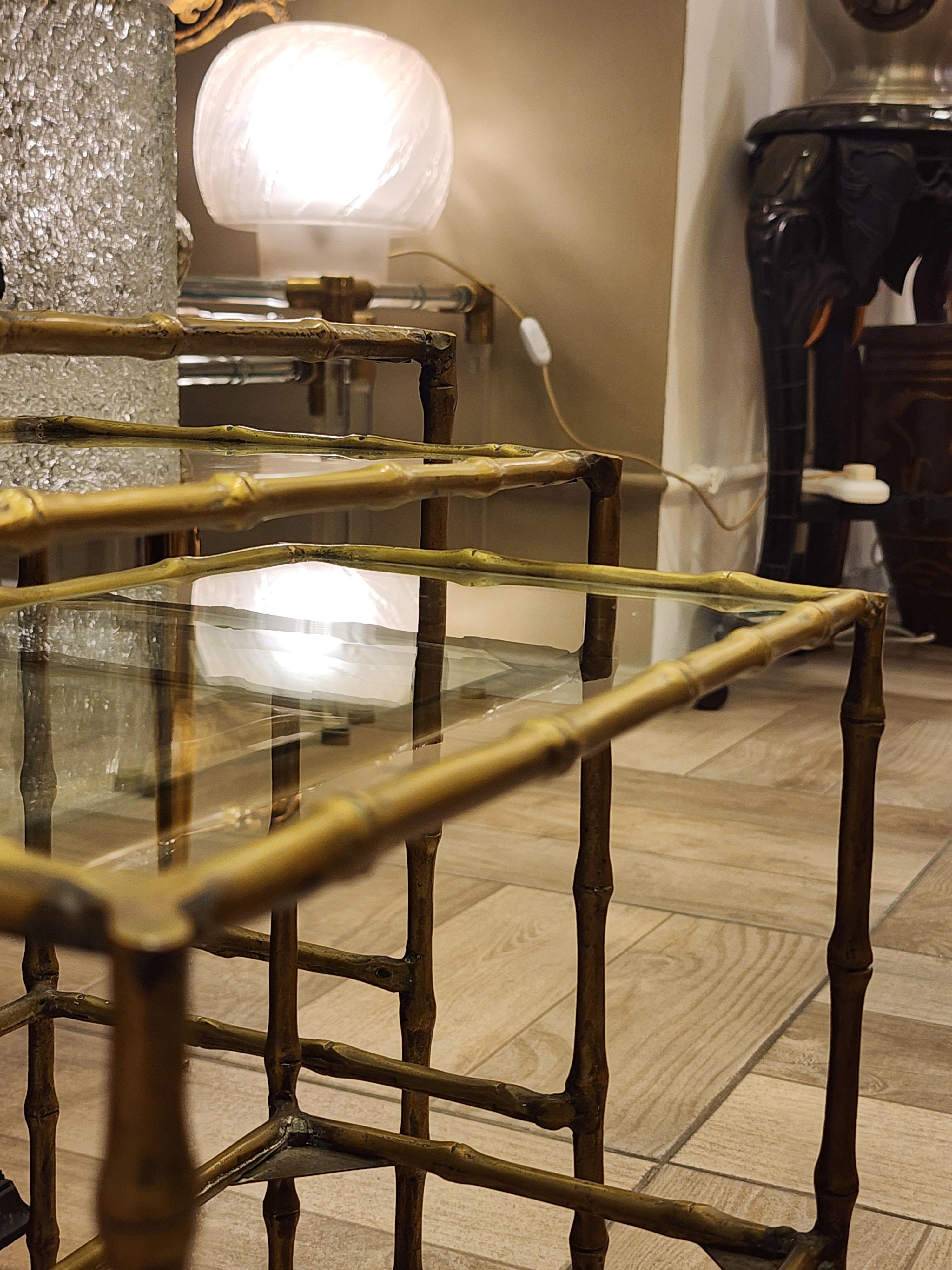 Set of Three Bamboo Bronze Tables by Maison Bagues Jansen
Elegant set of three vintage French mid-century bronze and faux bamboo tables with extendable glass tops. Created in France in the mid-century by designer Maison Bagues, each of these three