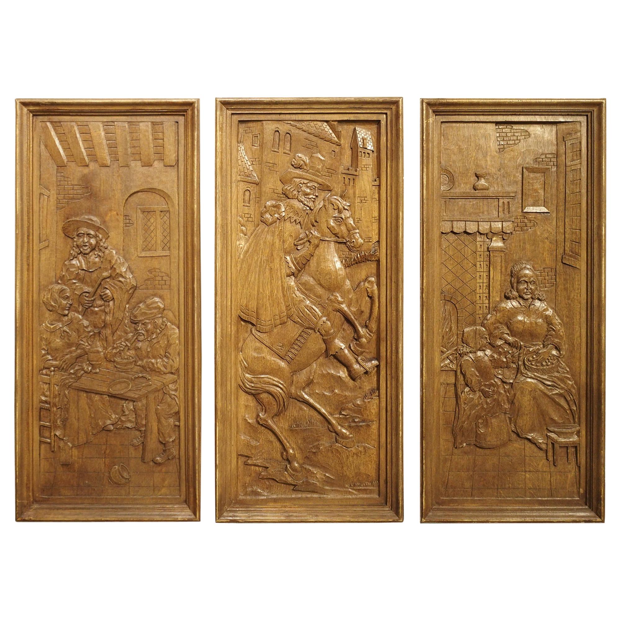 Set of Three Bas Relief Carved Belgian Panels, circa 1930