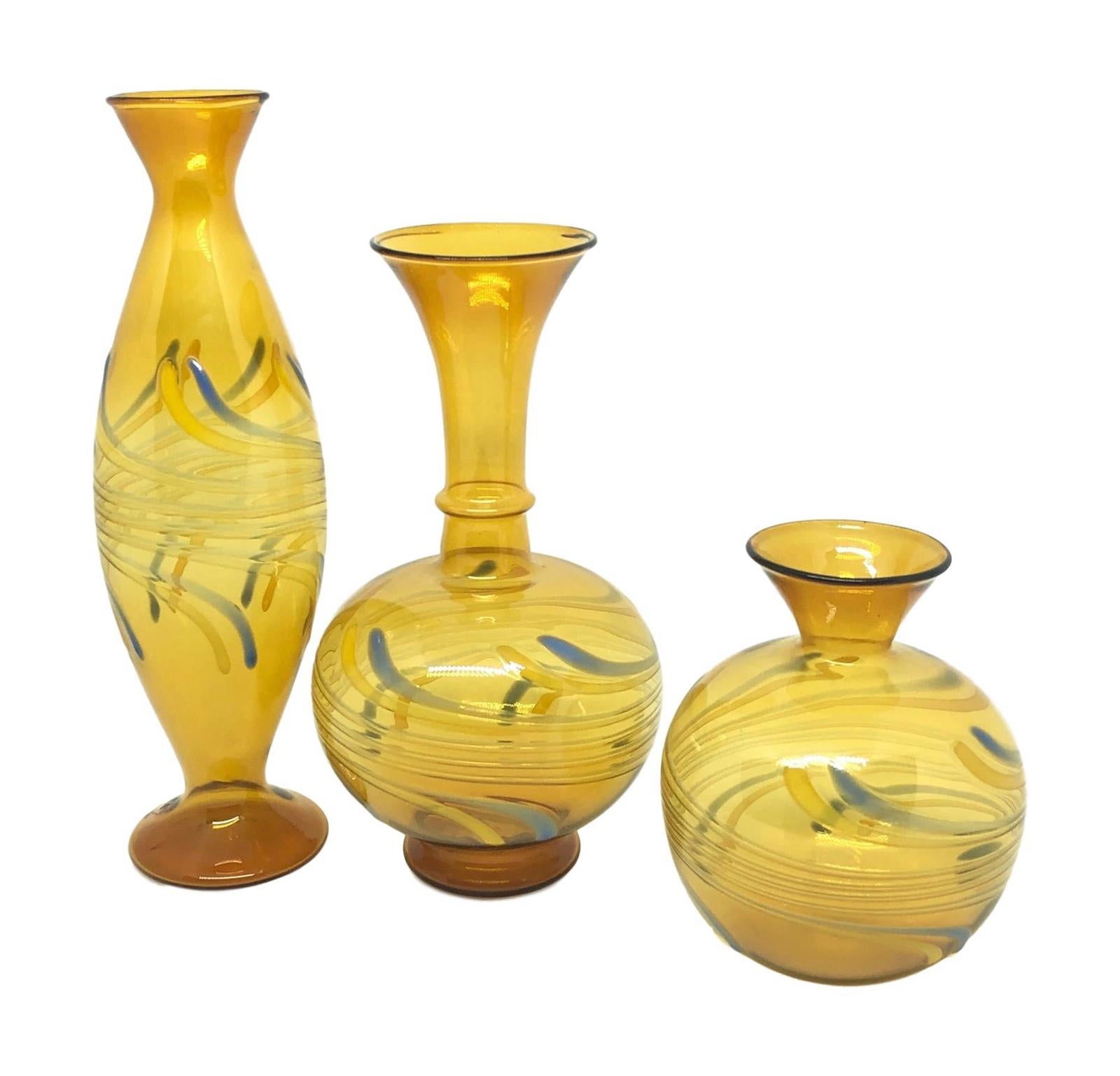 Set of three Classic mid-20th century hand blown glass vases, in the style of Bimini. Very good vintage condition, consistent with age and use. Tallest Vase is approx. 8 1/4