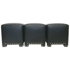 Set of Three Black Faux Leather Ottomans