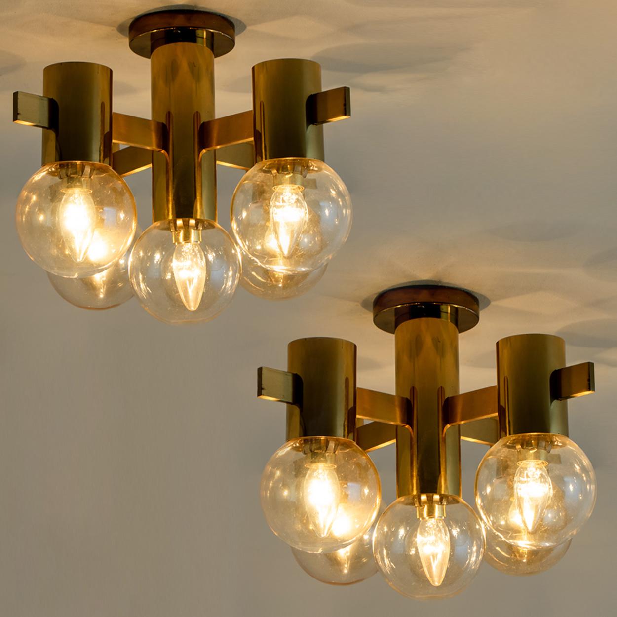 Mid-Century Modern Set of Three Brass and Glass Light Fixtures in the Style of Jakobsson, 1960s For Sale