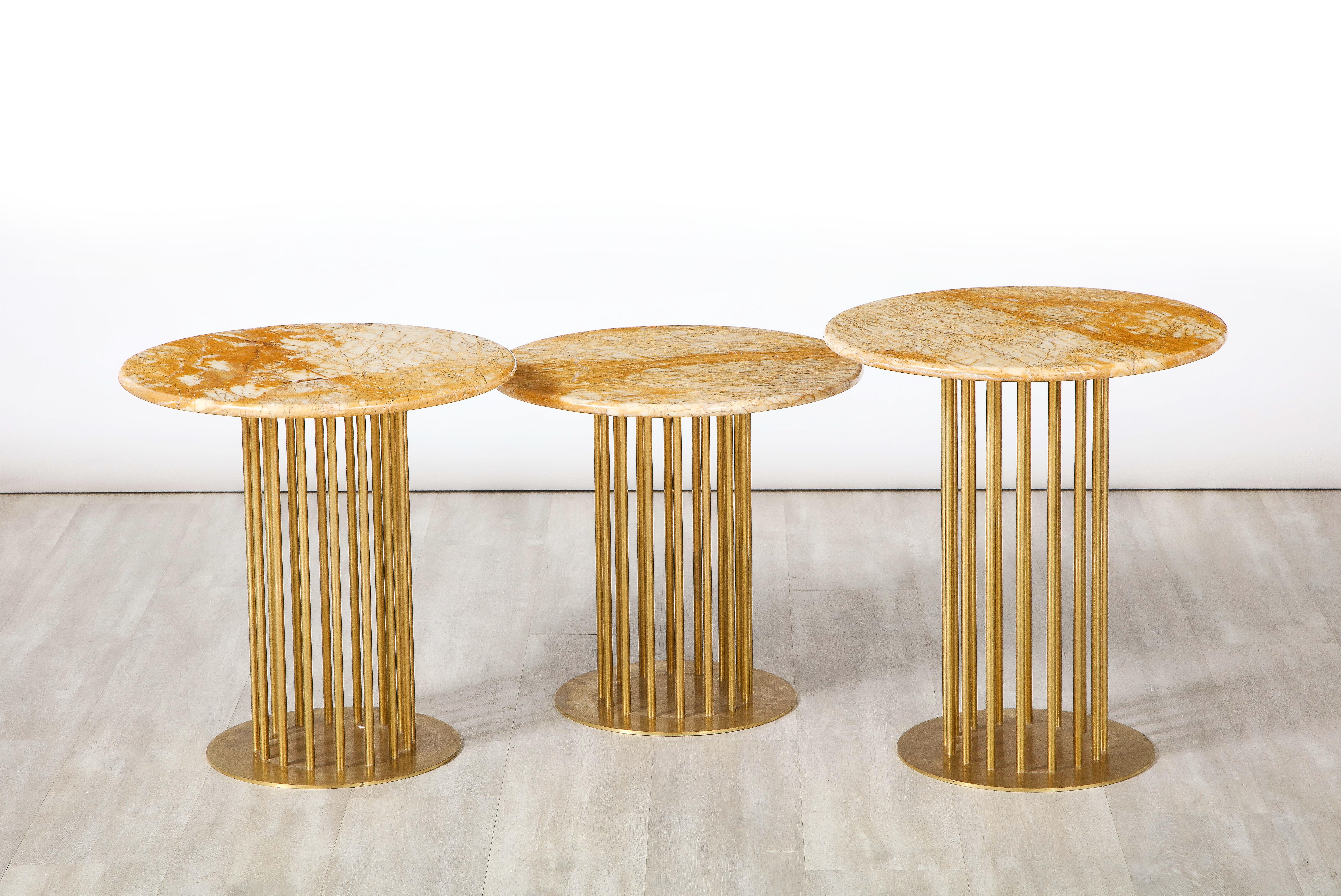 A set of three contemporary/custom side tables with brass circular bases which support the spindle leg design above which rests a gorgeous giallo Siena marble top. Can be purchased individually @ $4,750 each / $14,250 Set of three.
Italy,