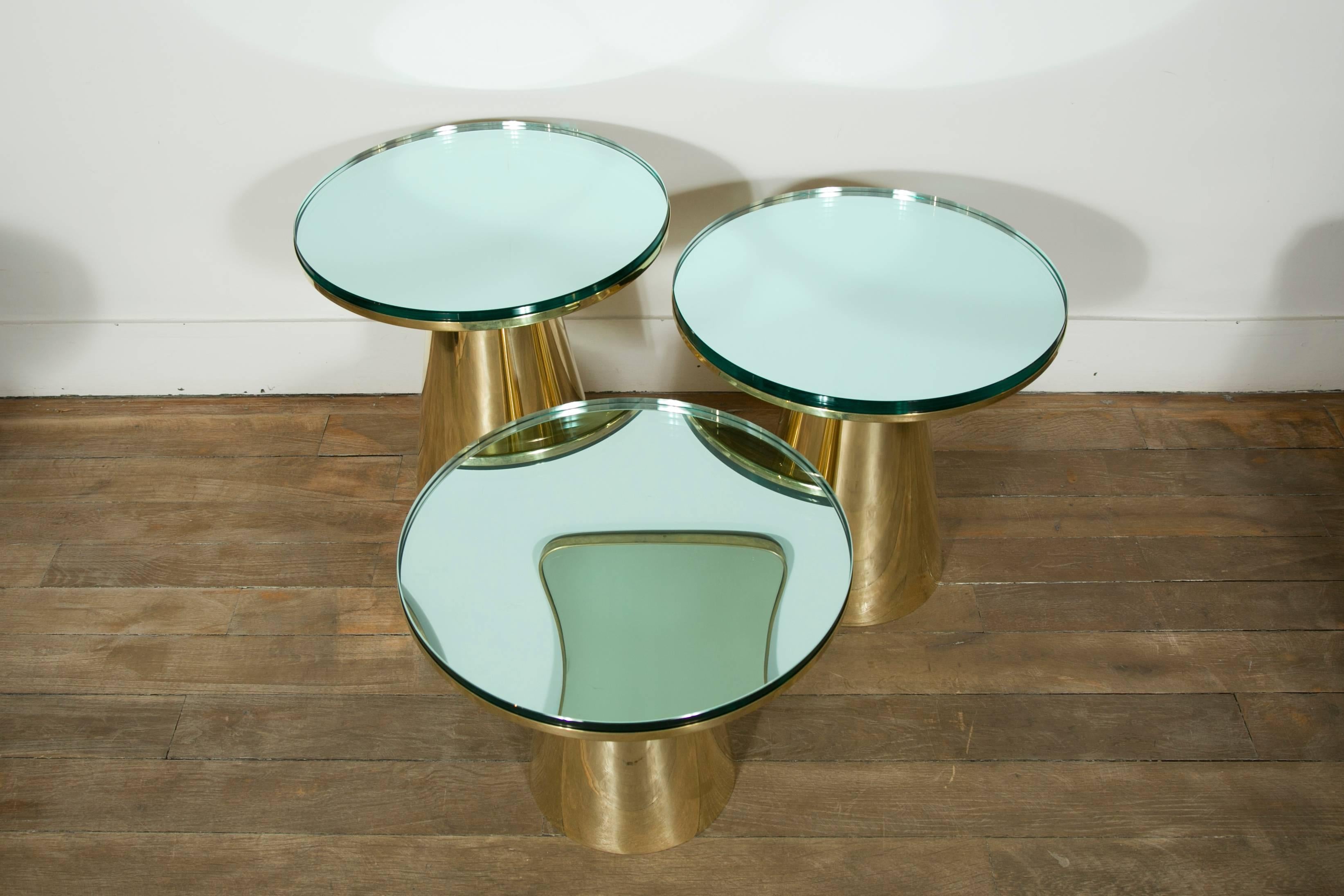 A set of three guéridons.
Thick vintage mirror tops on brass bases. 
Italy, 2017


Guéridon 1: 
Height 48 cm / 18.89 in.
Diameter 45 cm / 17.71 in.

Guéridon 2: 
Height 43.5 cm / 17.72 in.
Diameter 45 cm / 17.71 in.

Guéridon 3 
Height