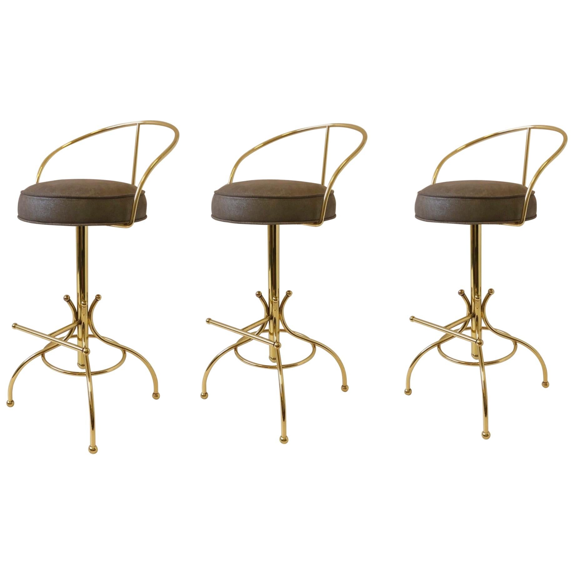 Set of Three Brass and Suede Leather Swivel Barstools by Charles Hollis Jones