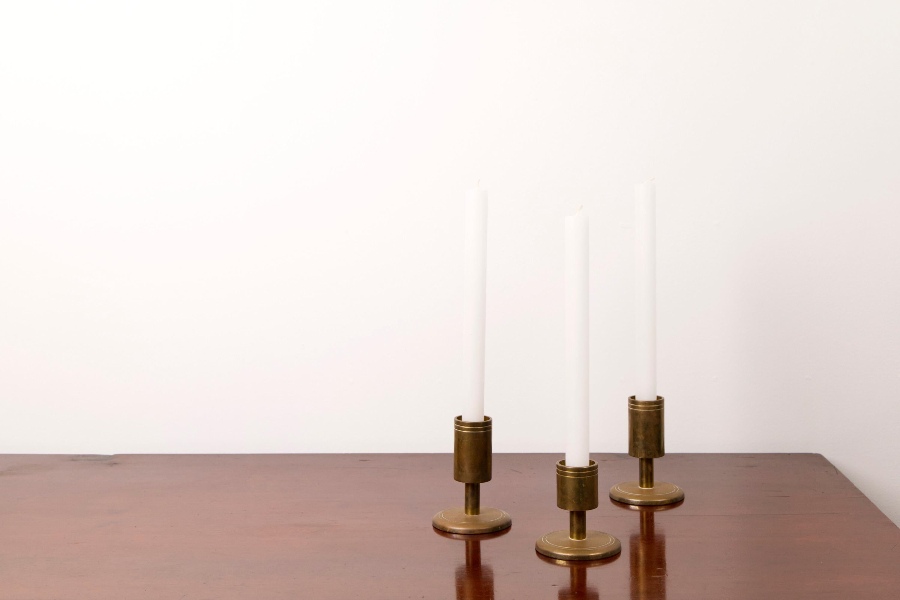 Scandinavian Modern Set of three brass candle holders by Dantorp, Denmark, 1960's For Sale