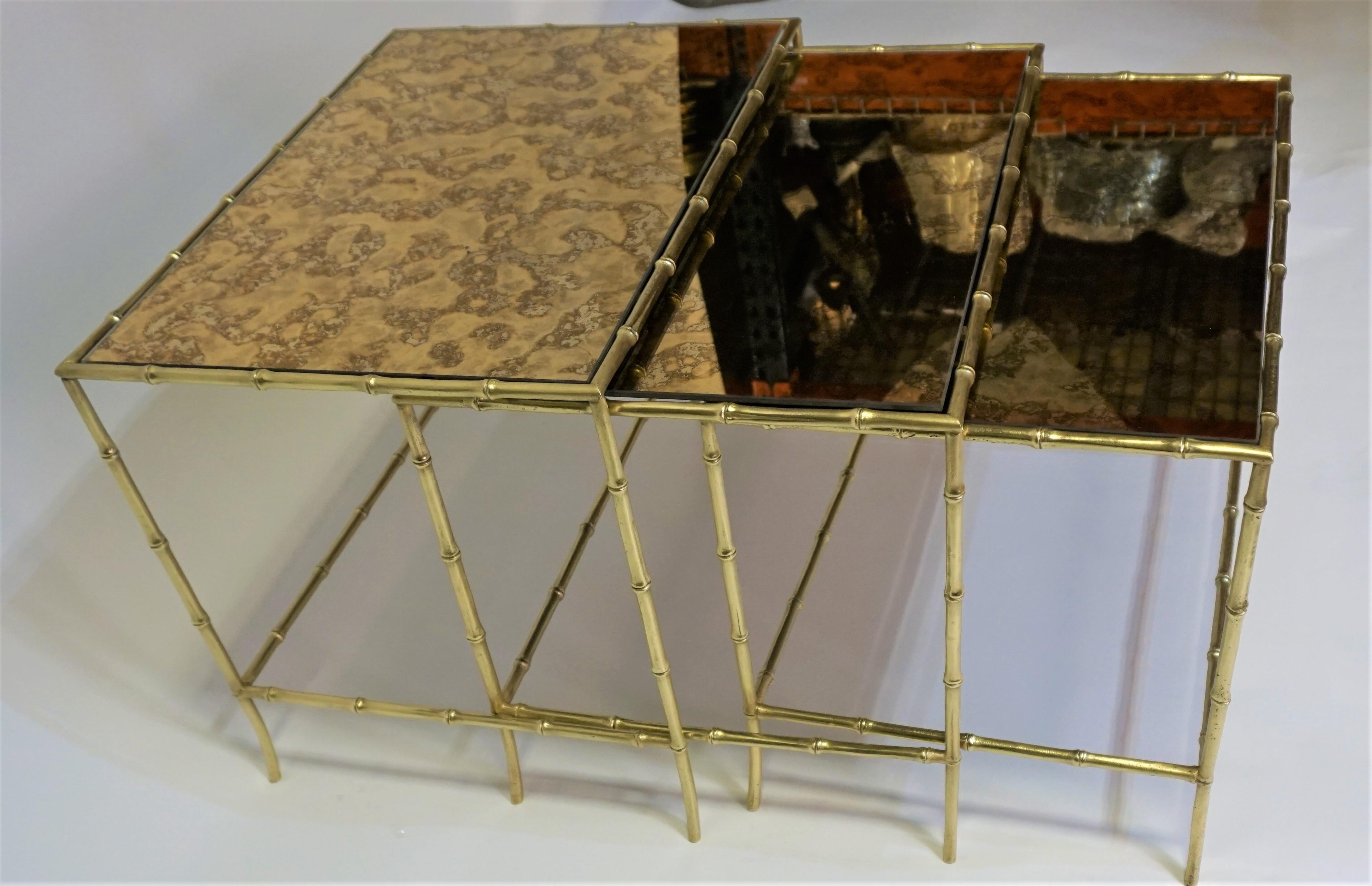 Set of three bronze faux bamboo with texture gold mirror nesting table. 
Measurement : 15.50