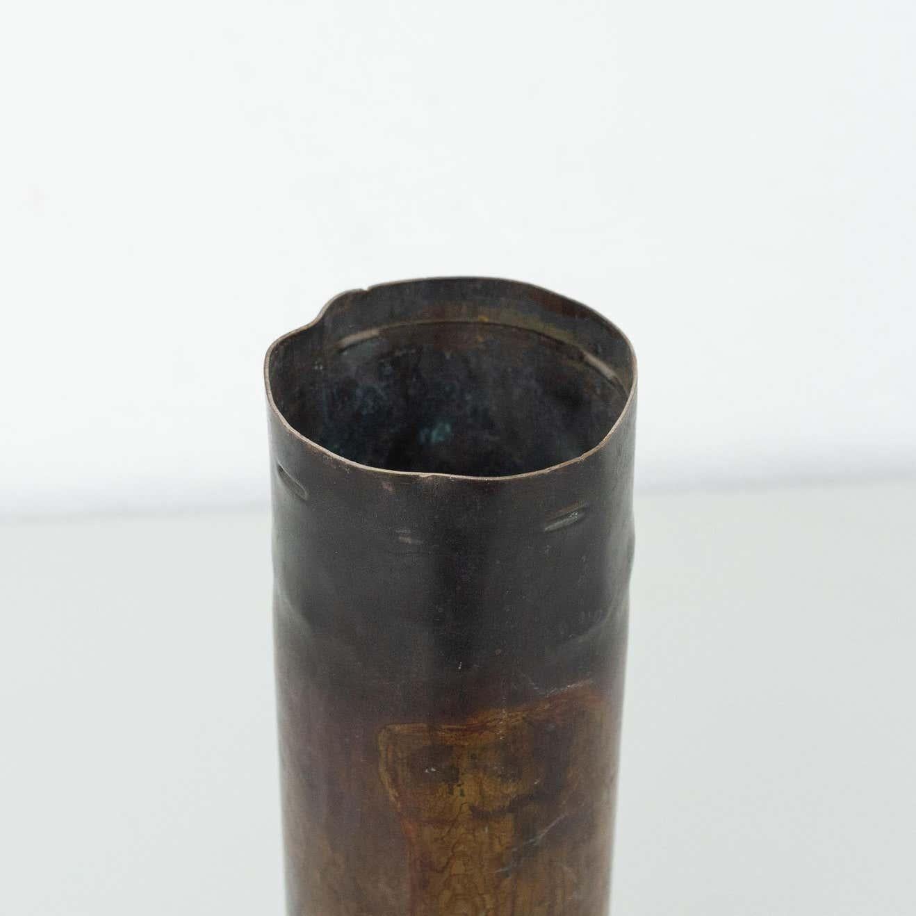 Set of three bronze vases.
By unknown manufacturer from Spain, circa 1930.
Previous use was bullets.

In original condition, with minor wear consistent with age and use, preserving a beautiful patina.

Material:
Bronze

Dimensions:
1: Ø 6 cm x H 31