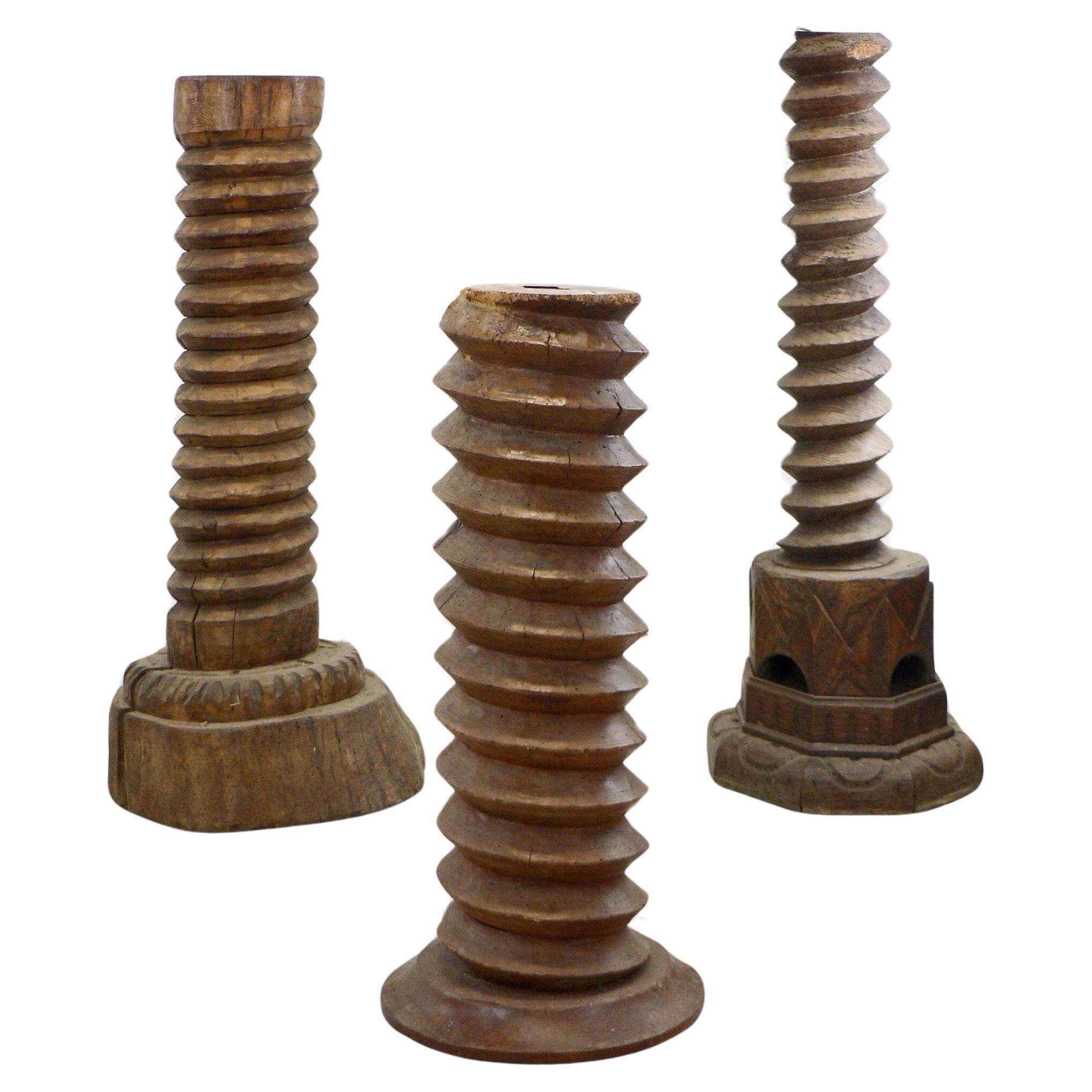 Set of three brutalist carved wood column France XIX th century.