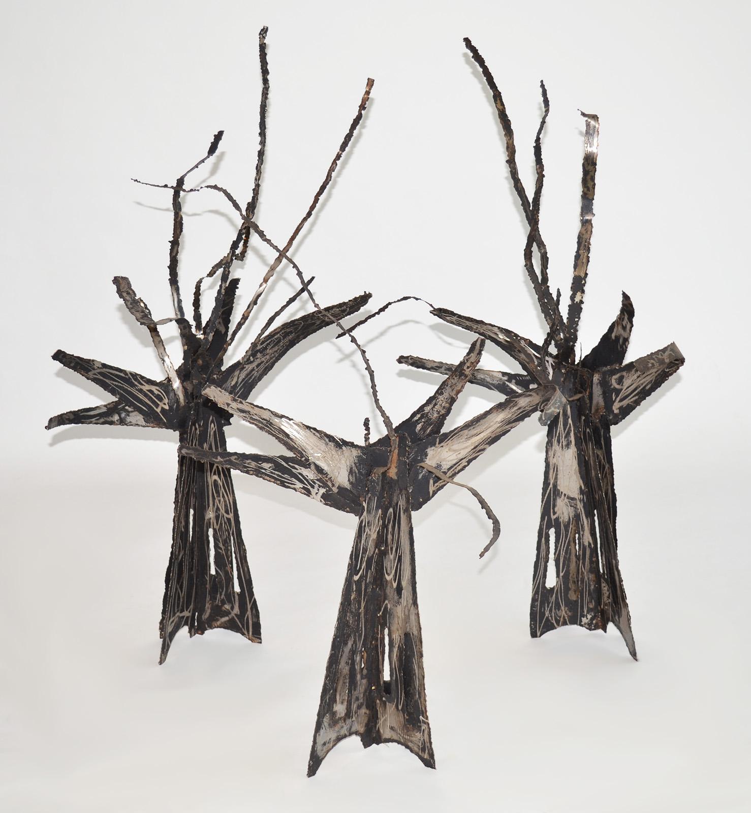 Set of Three Brutalist Metal Tree Sculptures like Jeré, Paul Evans, 1960's, USA
Torch-cut, welded and grinder-worked sheet metal in various organic abstract forms resembling trees. Finished in bare scrapes, cuts and grind marks exposing the shiny