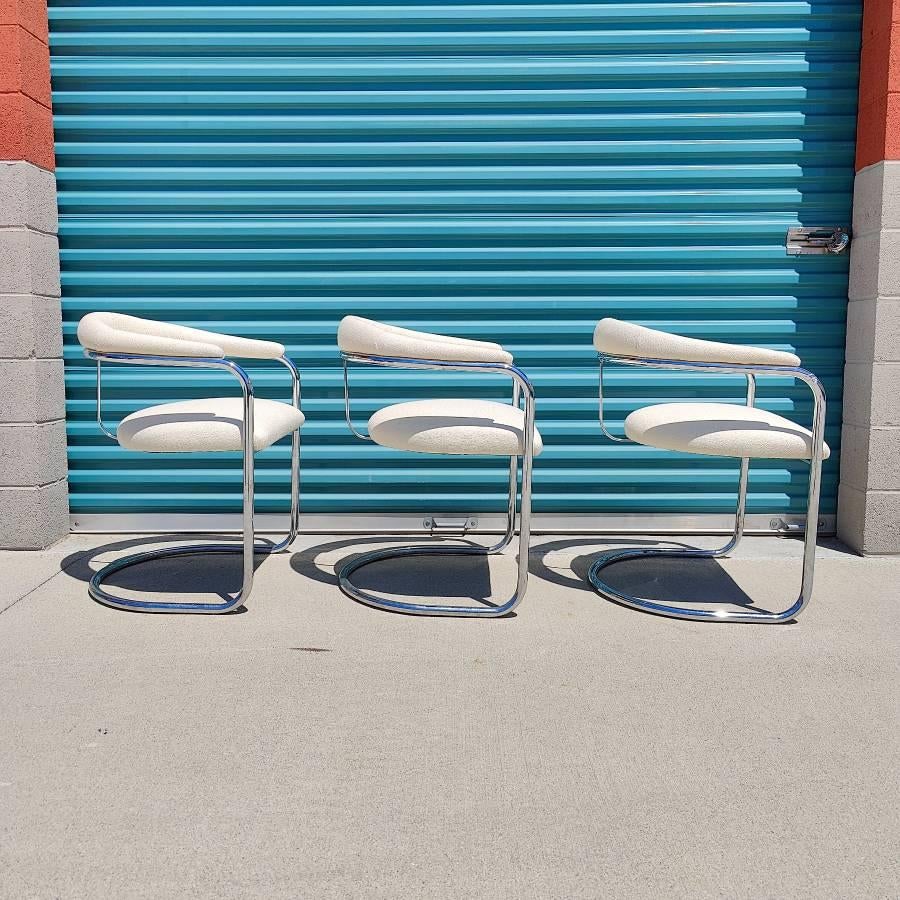 Newly Reupholstered in white fabric, now available are 3 chairs designed by Anton Lorenz for Thonet. Chrome is in original condition. Each chair measures approximately 23