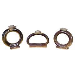 Set de tres portavelas de cerámica