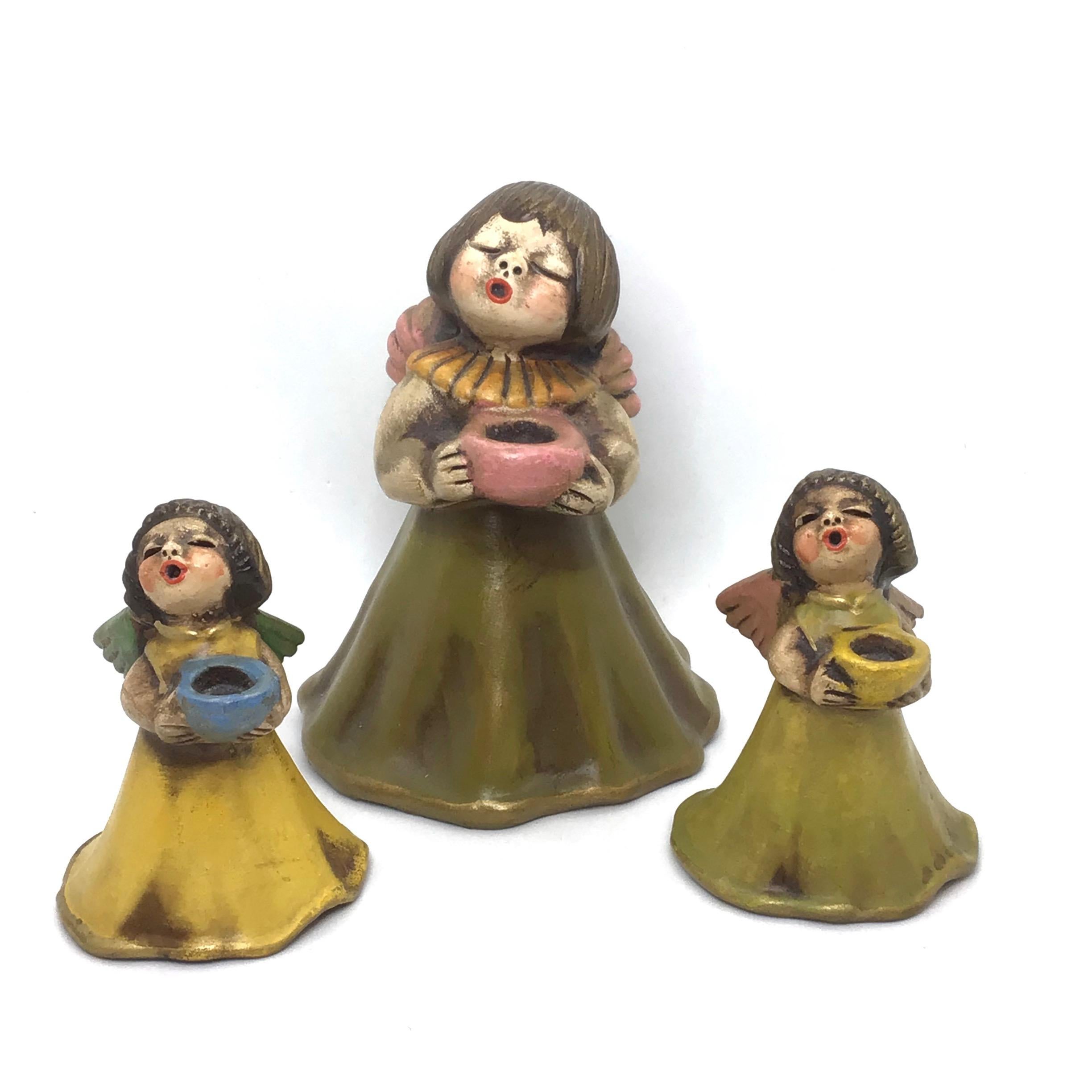 Beautiful set of Cherub Angel candle sticks, found at an estate sale in Italy. Made by Thun a well-known ceramic company in Italy. We believe that these pieces are from the 1960s. A nice addition to any room or for your Christmas decoration.