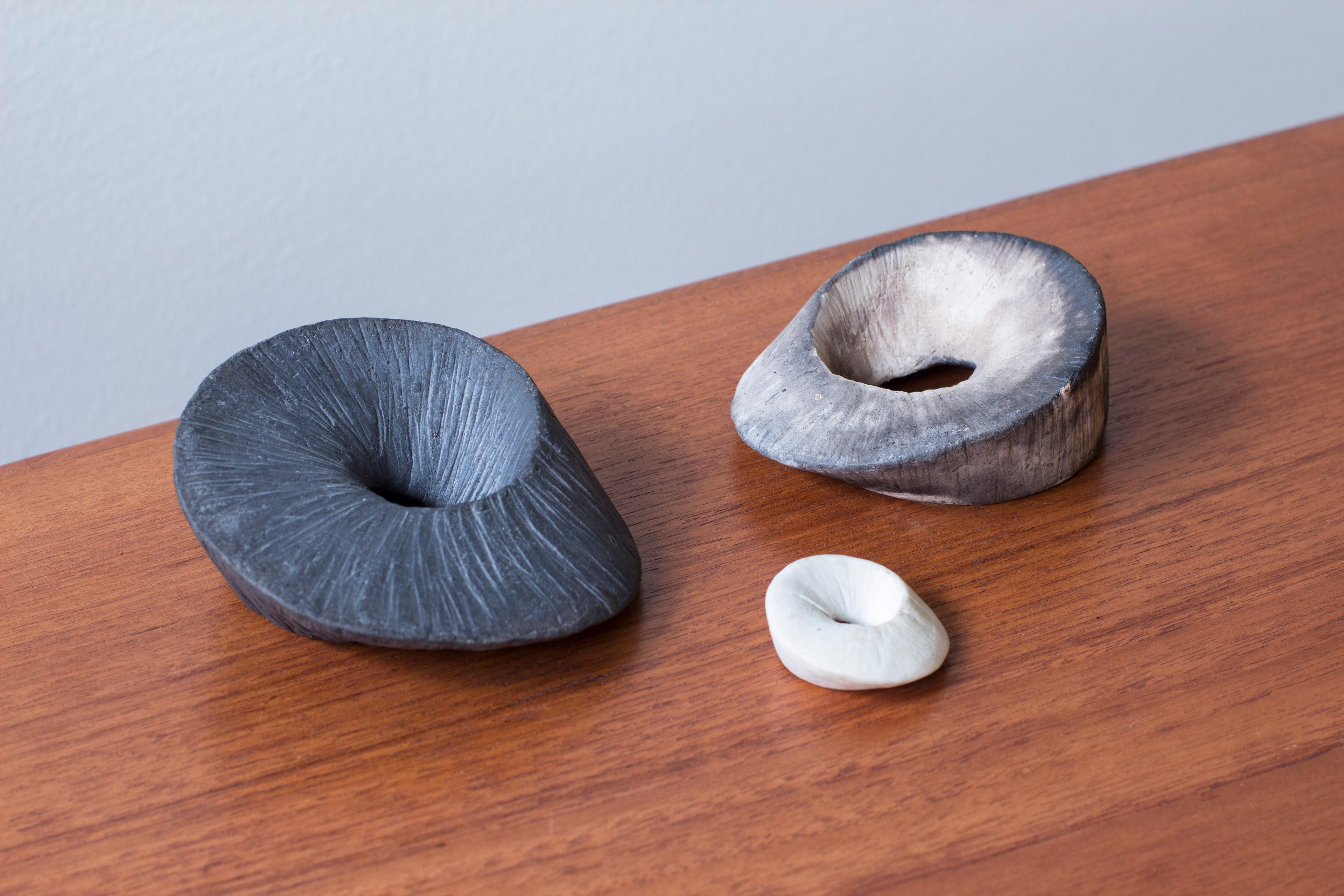 Set of three stoneware ceramic pieces by unknown Danish artist. Made sometime around the 1960-70s. The pieces mimic the look of fossils and are beautifully hand made with different glazes and textures. Very good vintage condition with few signs of