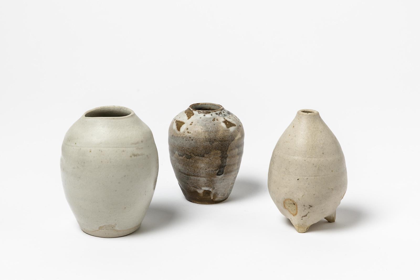 Lukas Richarz

Set of three small ceramic vases

Original white and grey ceramic colors,

21st century interior design

Original perfect conditions, signed under the bases

Realized circa 2010

Measures: Number one height 8cm, large