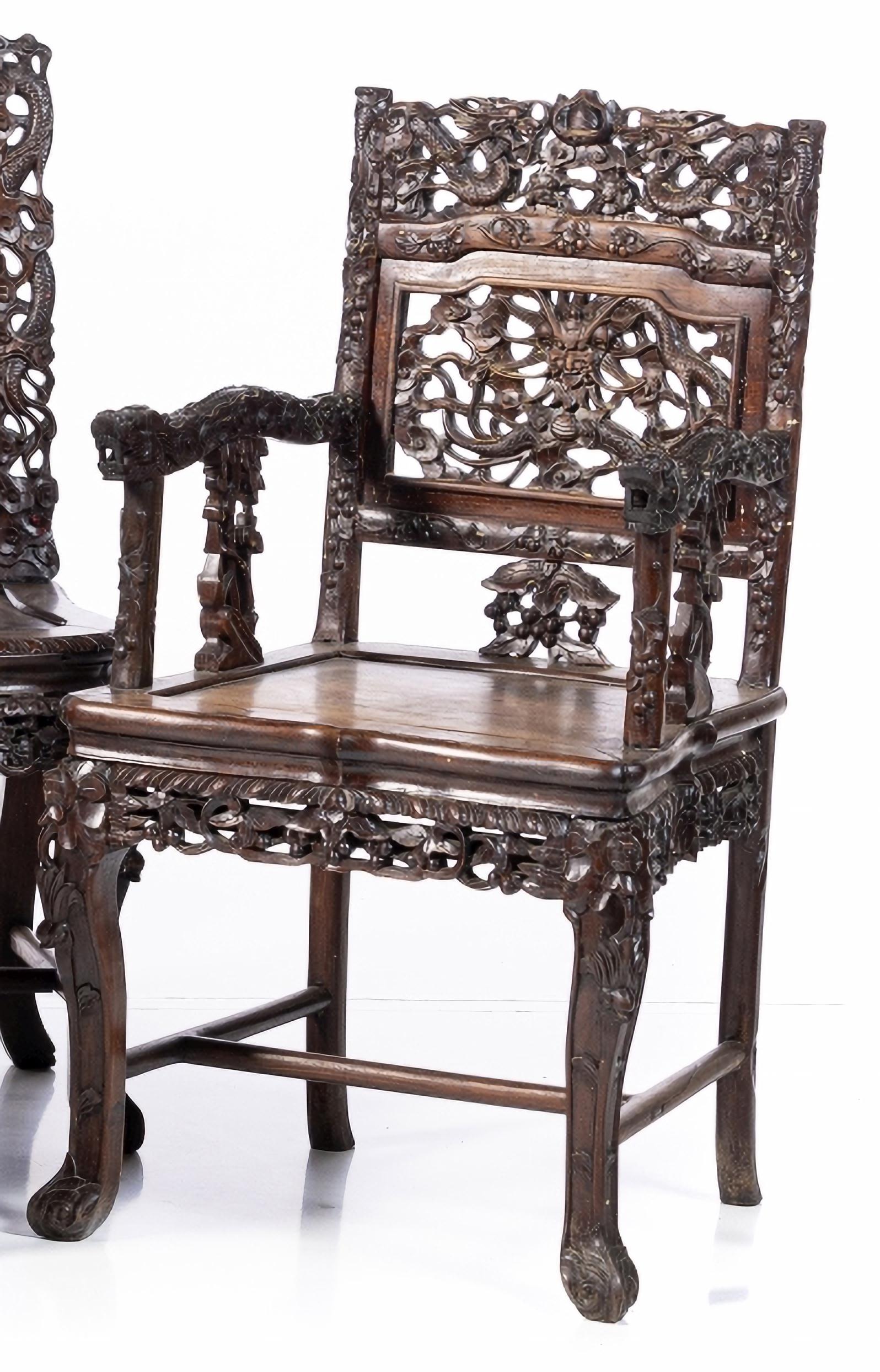 SET OF THREE CHAIRS AND TWO CHINESE ARMCHAIRS end 19th Century

in exotic wood, with carvings, 