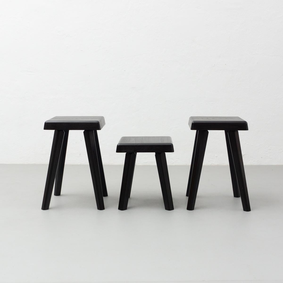 Set of three stool special black edition designed by Pierre Chapo in 1960s.
Manufactured by Chapo Creations in 2019, France.

Material:
Solid oakwood.

Stamped by the manufacturer

Measurements:
Short: D 29 cm x W 29 cm x H 33 cm
Tall: D